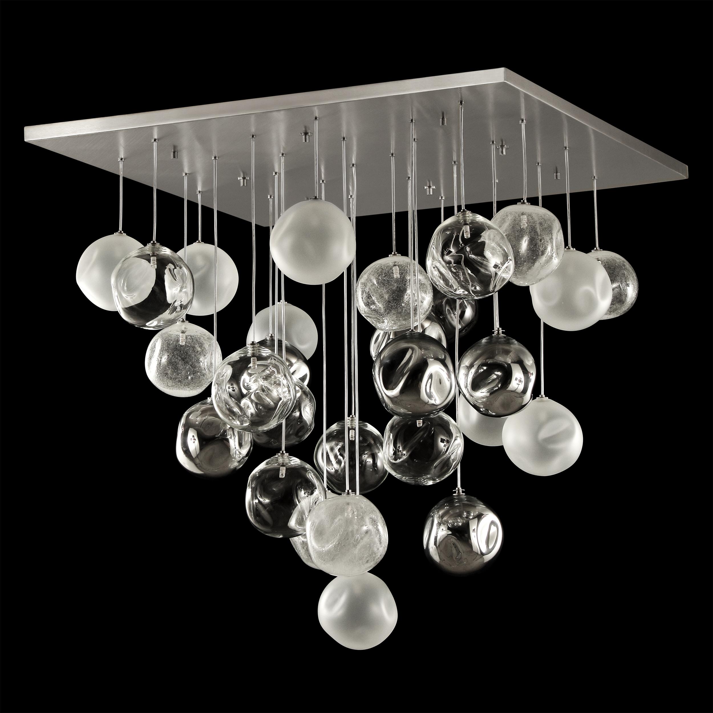 Artistic ceiling lamp, glass spheres in clear, satined, mirrored and Pulegoso size 100x100cm
Elegant and unmistakable, suggestive and poetical, soft and delicate are some of the adjectives that can be used to describe the blown glass ball