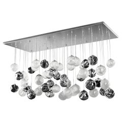 Illuminazione artistica da soffitto, sfere trasparenti, satinate, specchio Pulegoso di Multiforme