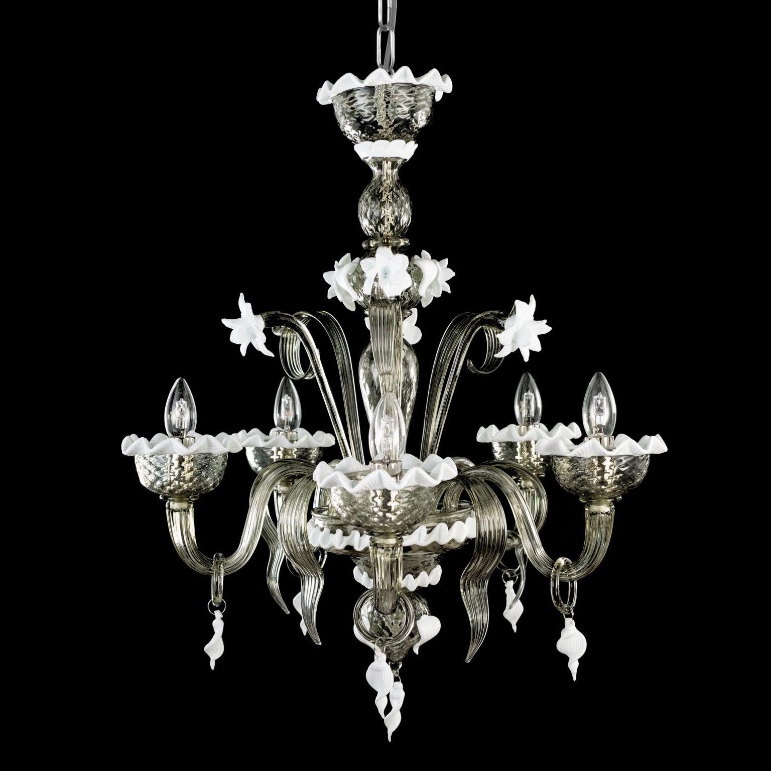 Artistic chandelier 5 arms in dark grey Murano glass and white details Springtime.
The peculiar characteristic of this lighting work is the richness of its decorations. 
Springtime reflects the authentic Murano glass tradition, which has become