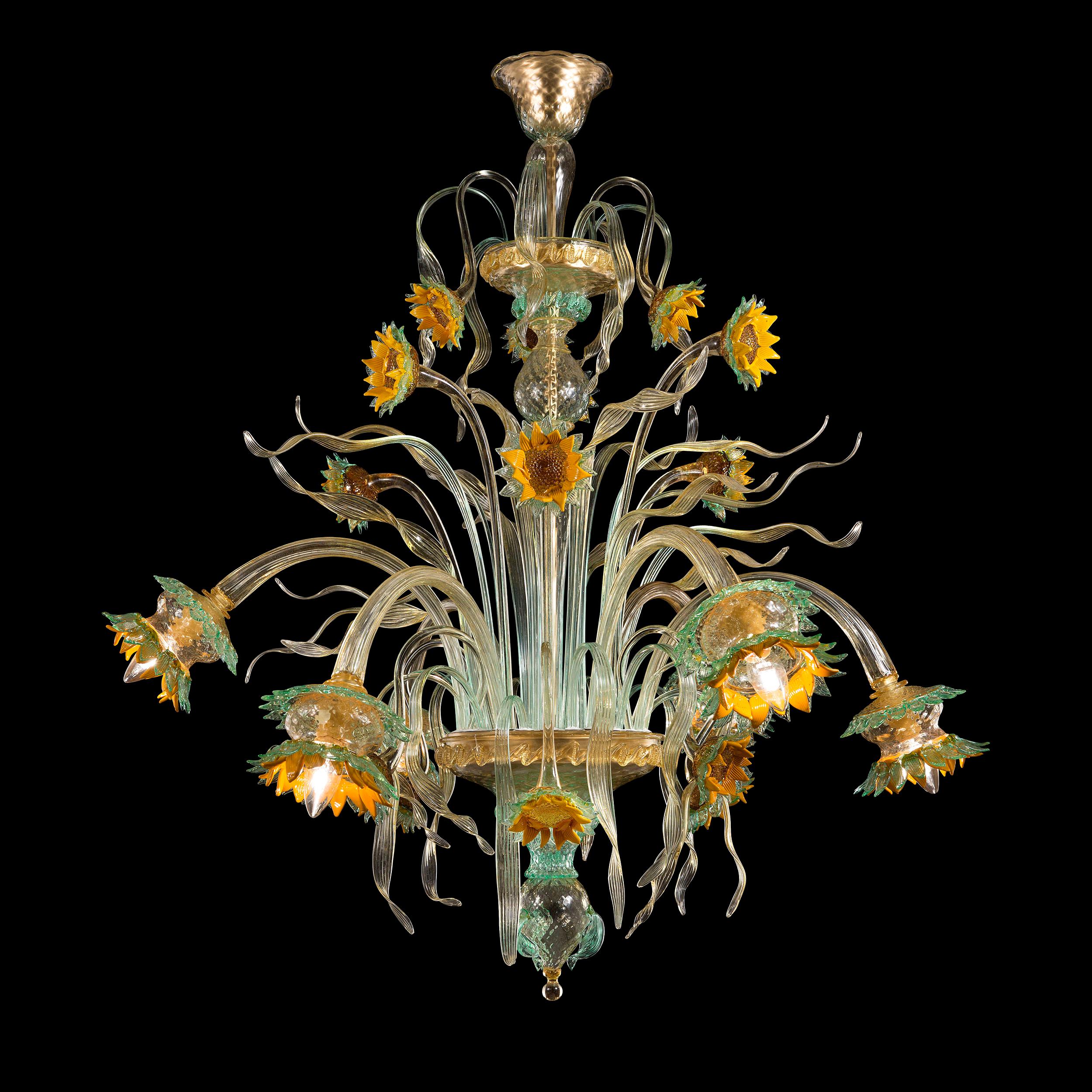 Artistic chandelier 6 arms clear-amber-green in Murano glass Girasole by Multiforme.
Girasole, as Rosae Rosarum and Iris, is one of our three collections inspired from the flowers. But the venetian chandelier series Girasole is also a tribute to