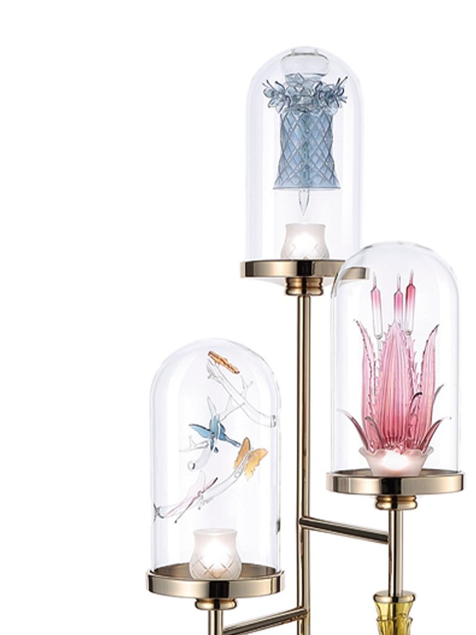 The Jardin de Verre collection by Alessandro La Spada, a love story between man and nature, the tale of a nineteenth century English Doctor, Nathaniel B. Ward, who was passionate about botany.


The chandelier, as well as the wall lamps, bases