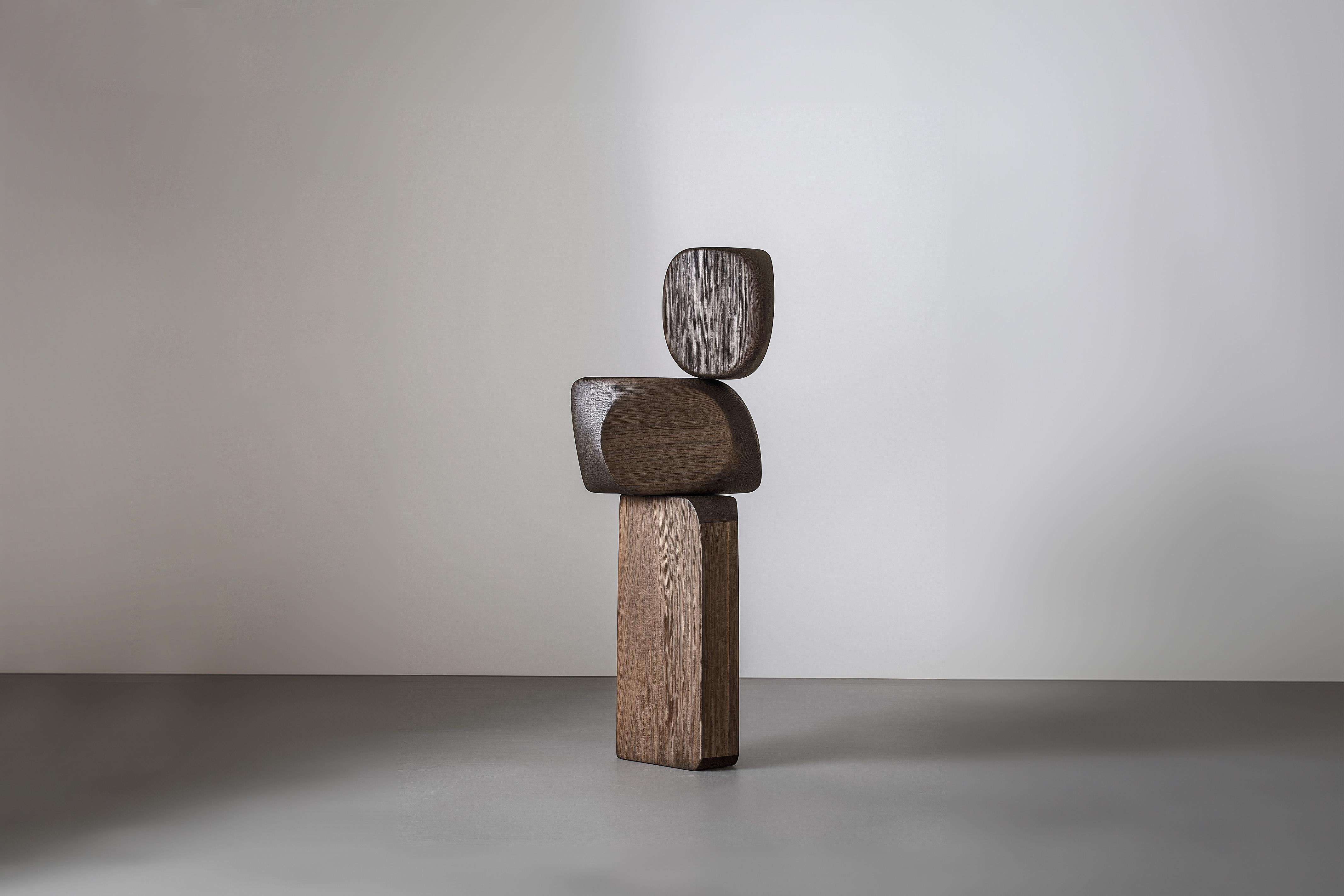 Artistic Installation Lull No37 – NONO’s Contemporary Wooden Sculpture
———
Balance and tension are at the core of these sculptures. The interplay between the smooth, rounded forms and solid, angular bases creates a delicate equilibrium that invites