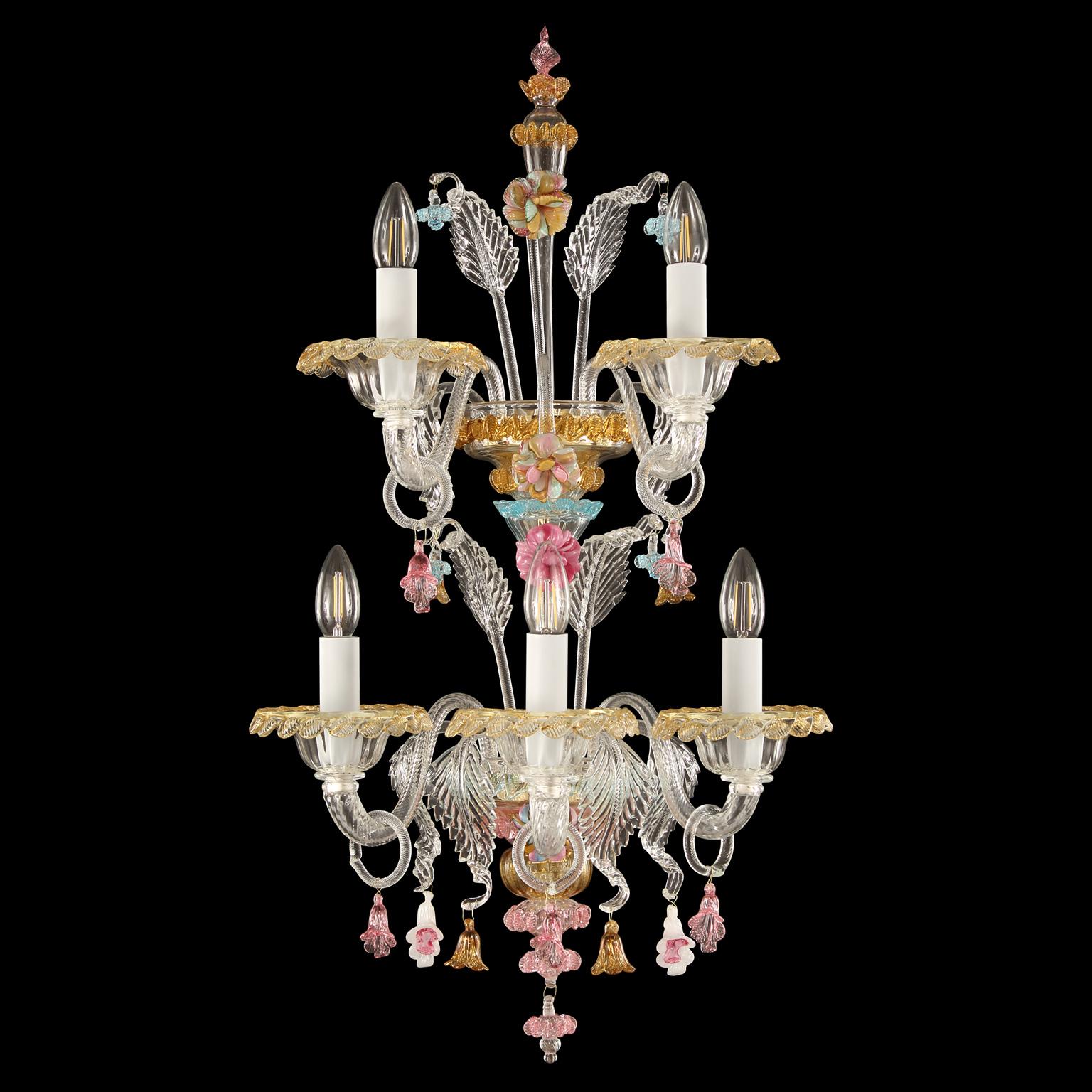 Toffee sconce 3+2 clear and multi-color Murano glass by Multiforme.

The artistic glass collection Toffee is an elegant and delicate lighting work. The structure is a combination of well-proportioned volumes that creates a refined sconce.
It is
