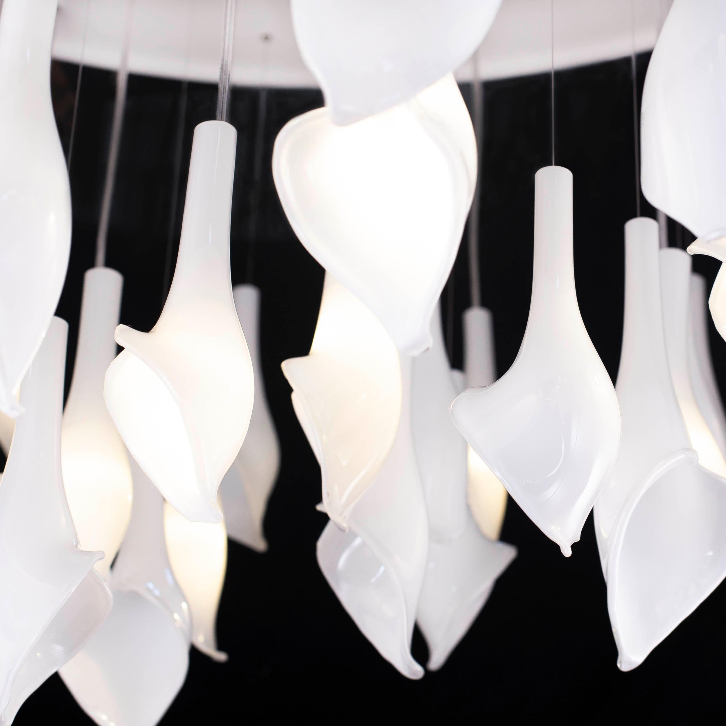 Artistic Ceiling Lighting, White Murano glass drops by Multiforme 

Italian craftsmanship is by nature devoted to Beauty, of which the collection we have called ‘Destin Charmè’ is a daughter. A poetic and delicate work of light that illuminates the