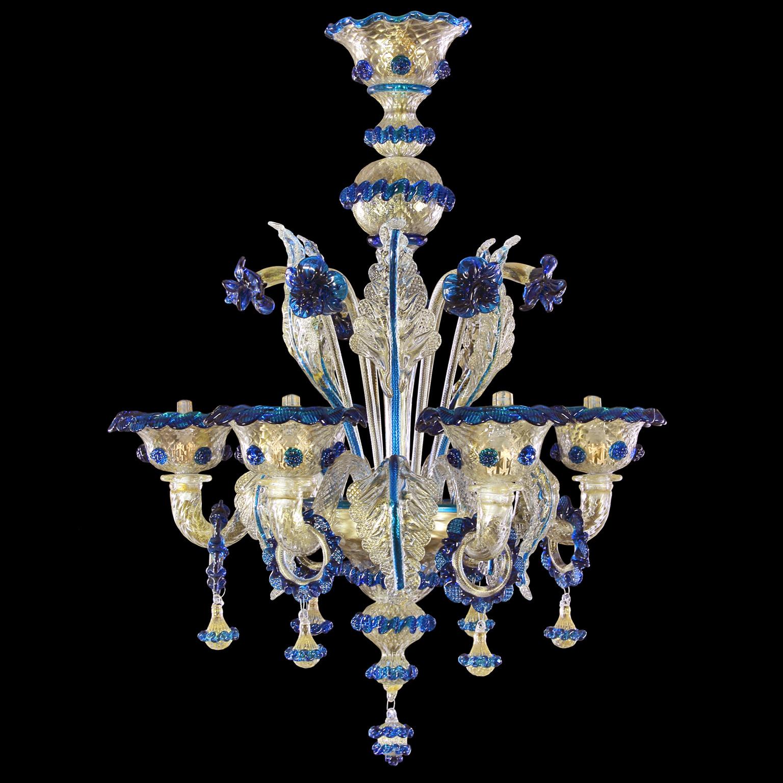 Galliano chandelier, 6-light, gold Murano glass, blue details by Multiforme.
This artistic glass chandelier has 6-light, is handmade in crystal and pink glass with polychrome vitreous paste glass flowers.
Galliano is our tribute to the authentic