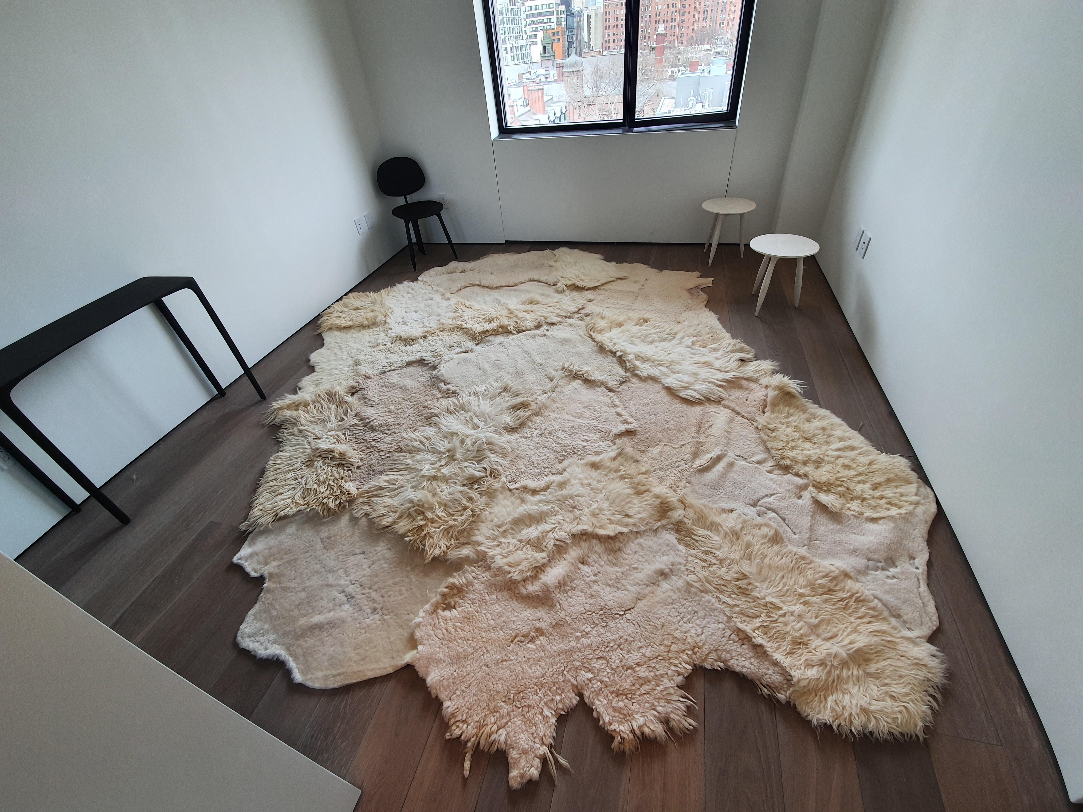 Artistic rug by Carine Boxy
Dimensions: 390 x 300 cm
Materials: Naturally dyed sheepskin

Each rug is different and unique, please contact us for made to order dimensions.
Carine Boxy is internationally known for her artistic sheepskin rugs.