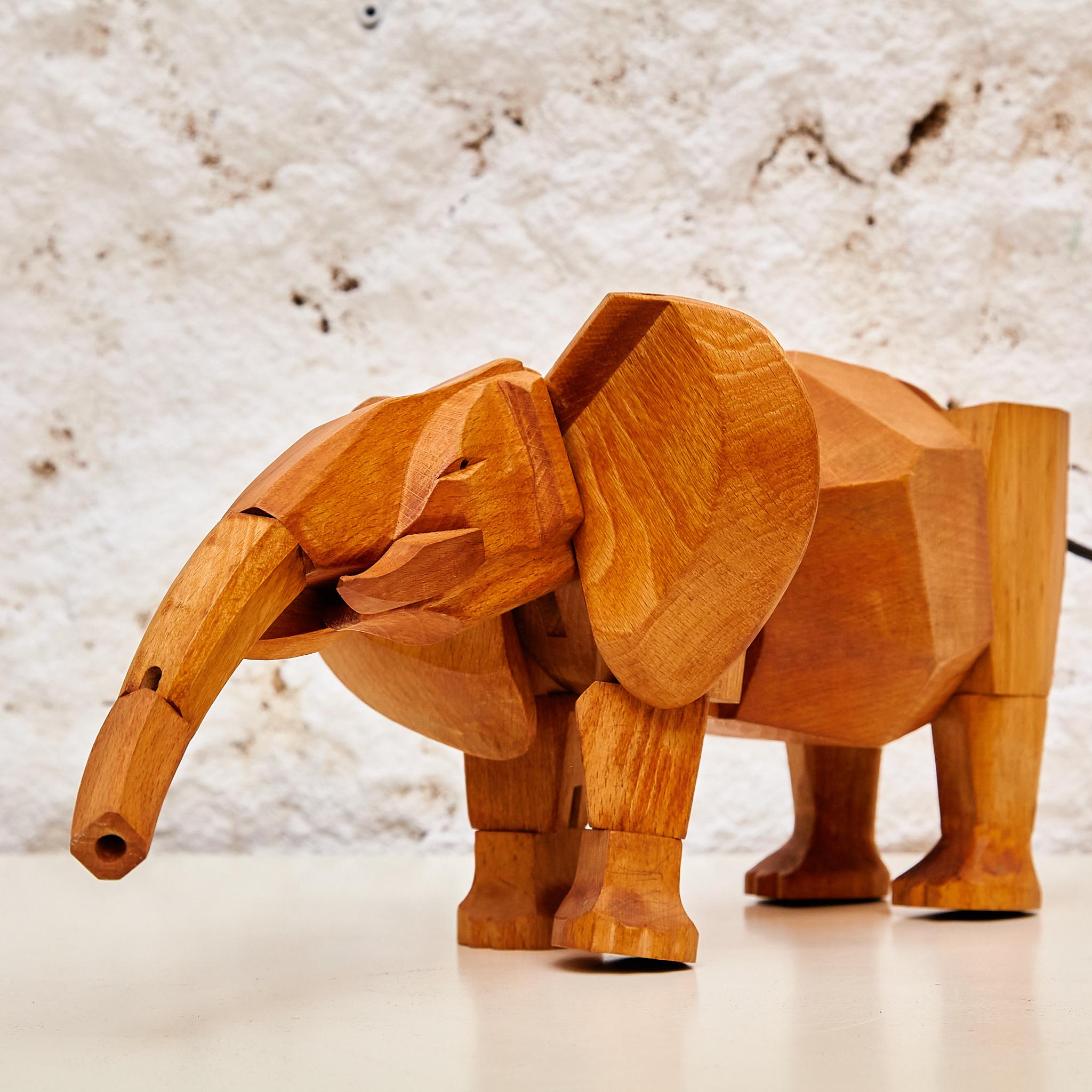 Artistry in Wood: 'Areaware' Solid Wood Elephant Sculpture by David Weeks Studio 5