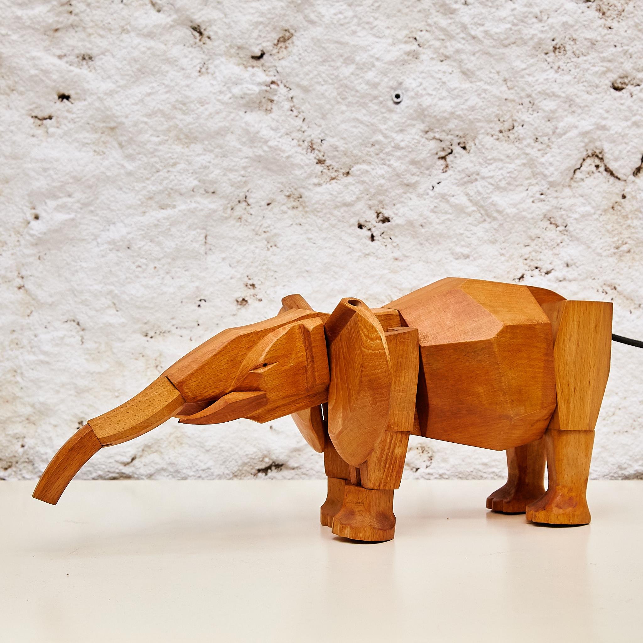 Mid-Century Modern Artistry in Wood: 'Areaware' Solid Wood Elephant Sculpture by David Weeks Studio