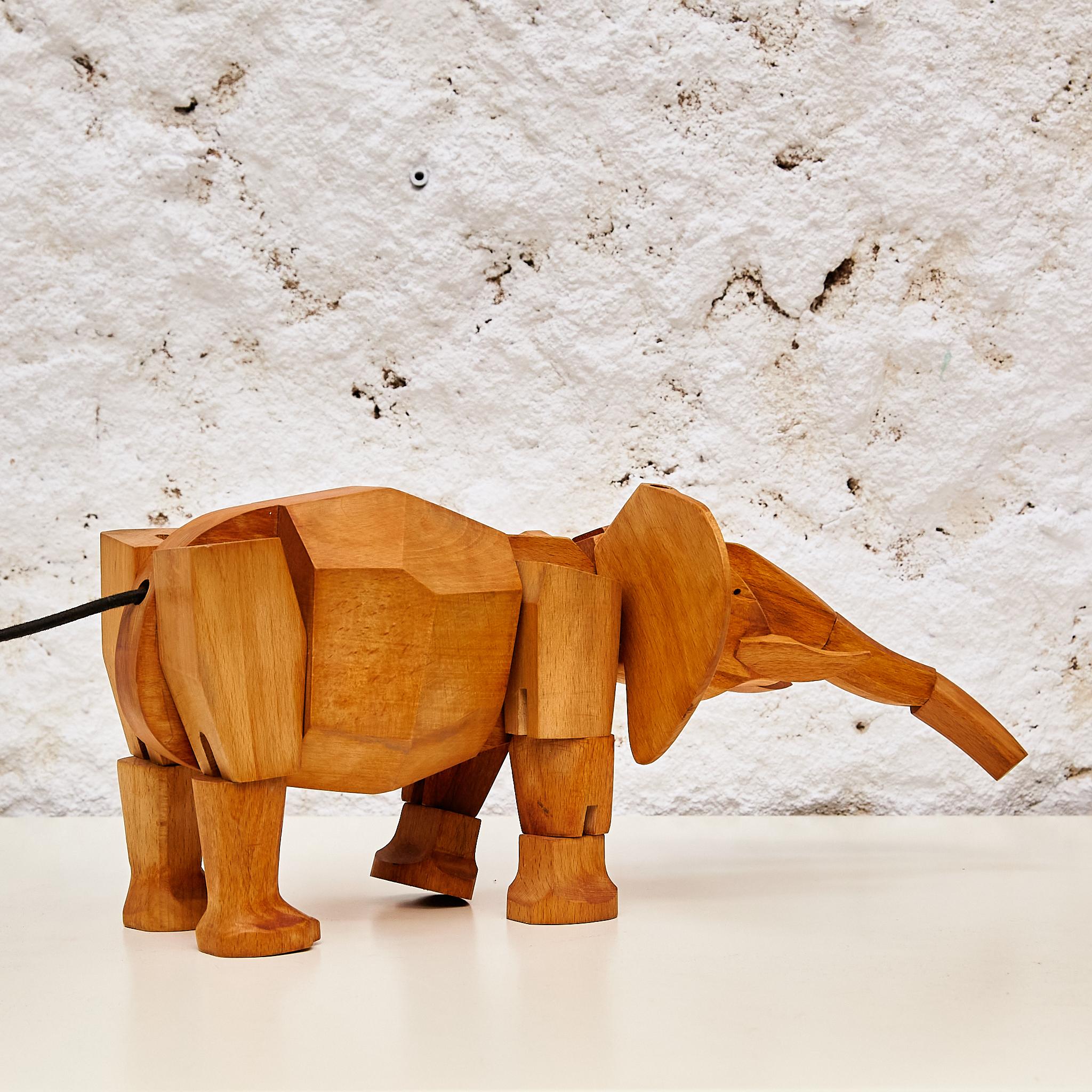 Contemporary Artistry in Wood: 'Areaware' Solid Wood Elephant Sculpture by David Weeks Studio
