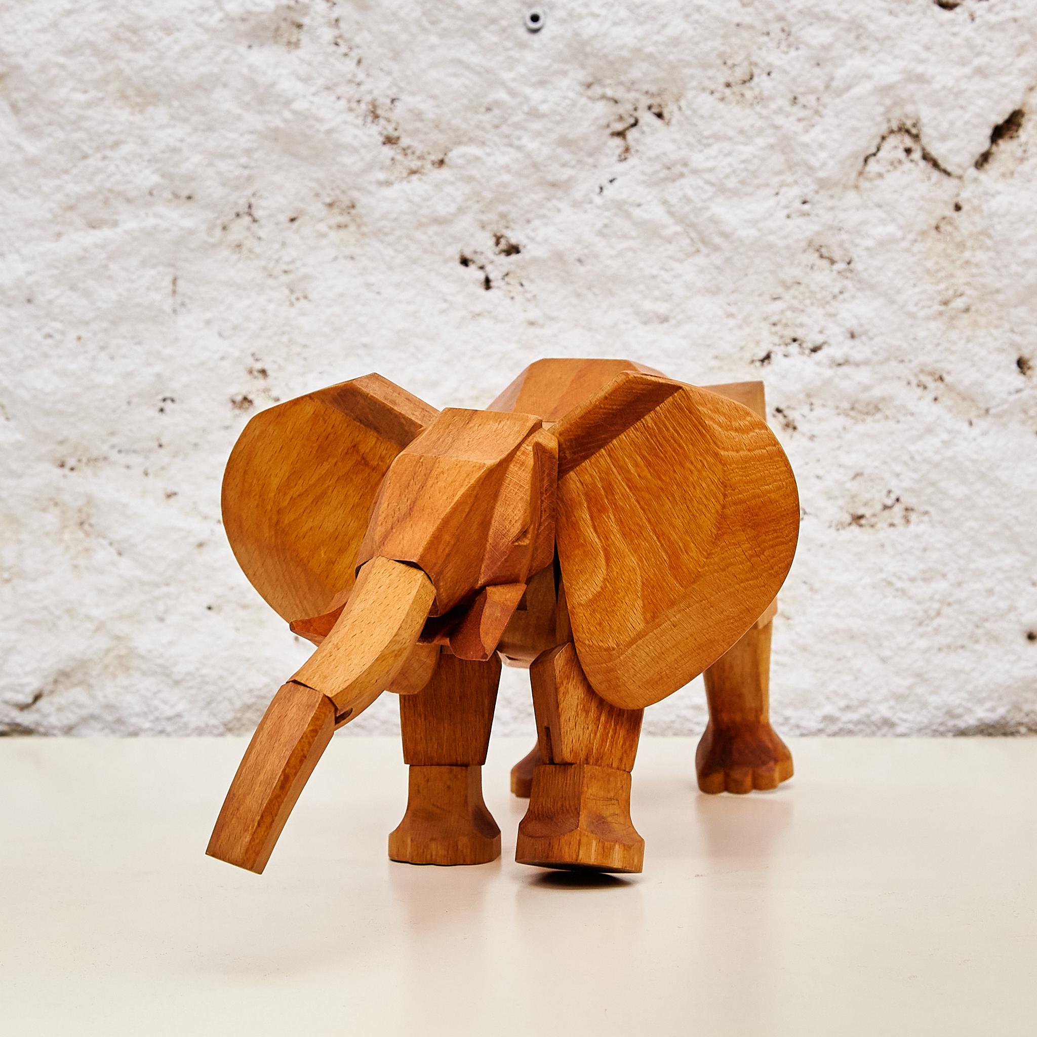Artistry in Wood: 'Areaware' Solid Wood Elephant Sculpture by David Weeks Studio 2
