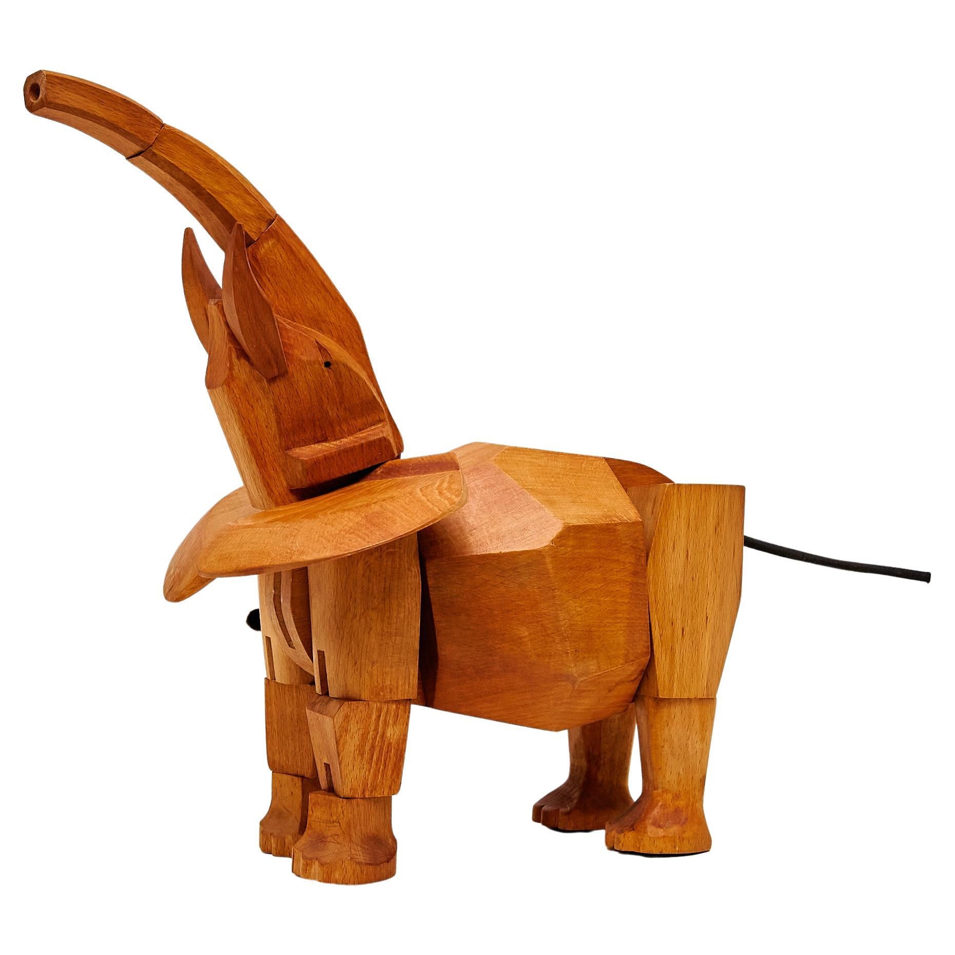 Artistry in Wood: 'Areaware' Solid Wood Elephant Sculpture by David Weeks Studio