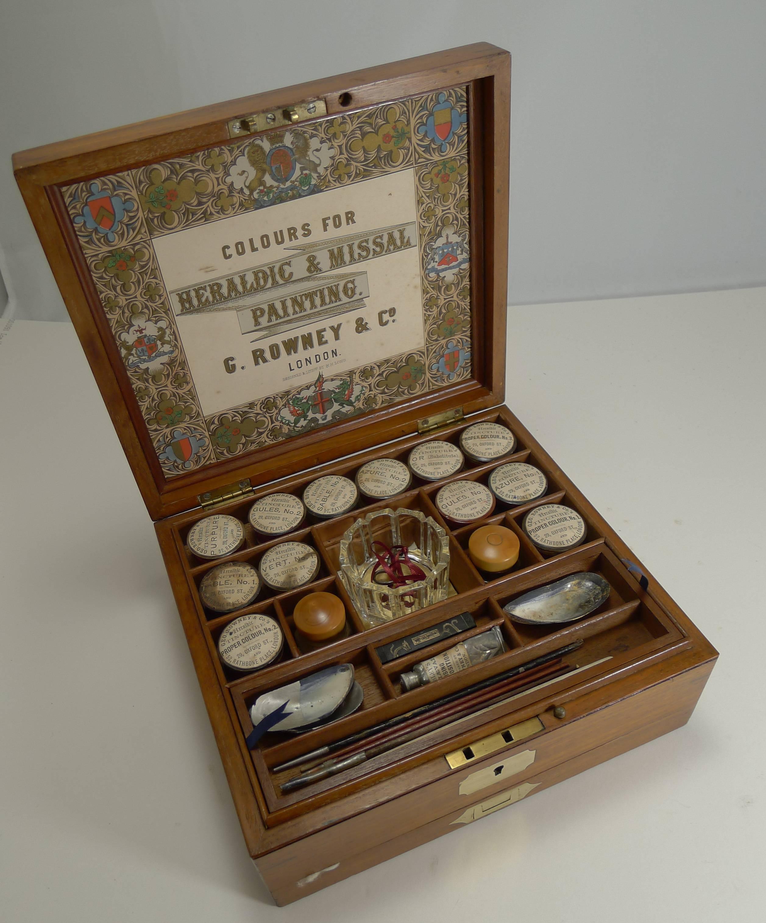 A truly exquisite example of a Victorian mahogany artist's paint box made from mahogany with cut brass inlaid plaque to lid with complimentary escutcheon and the flush drawer pull to the front. The box comes with the working key.

The box opens to