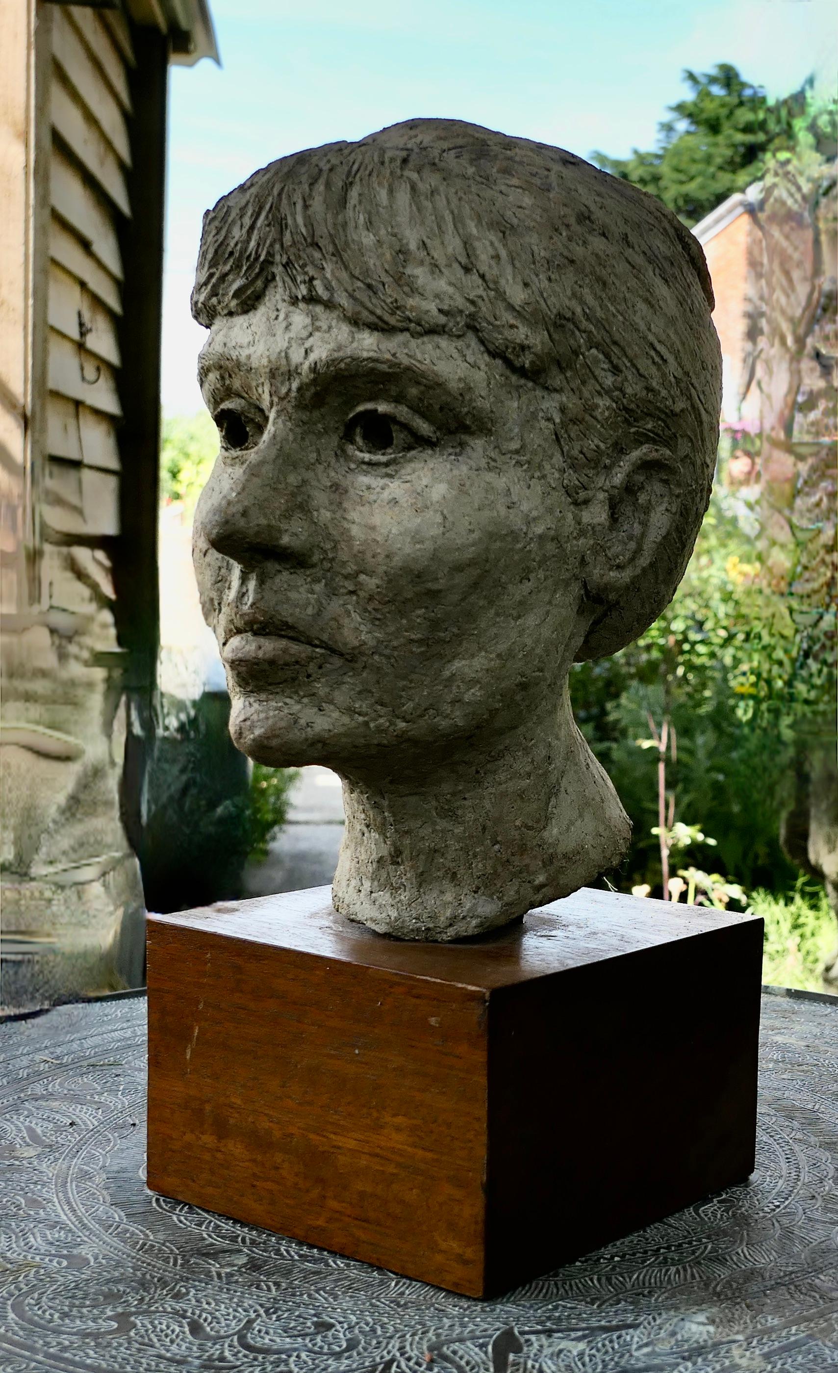 

Artist’s Bust of a Woman, not signed

This is a hand made piece dating from the middle of the 20th Century, it was discovered during refurbishment of an Art Studio 

It is a three dimensional head of a lady made in clay with a weathered patina set