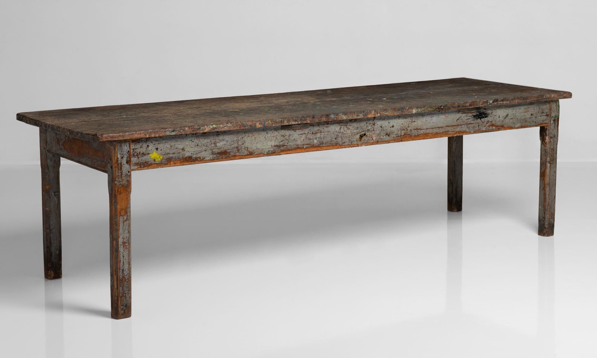 Artist's dining table, England, circa 1900.

Pine top and oak frame work table with original paint remnants and amazing patina.