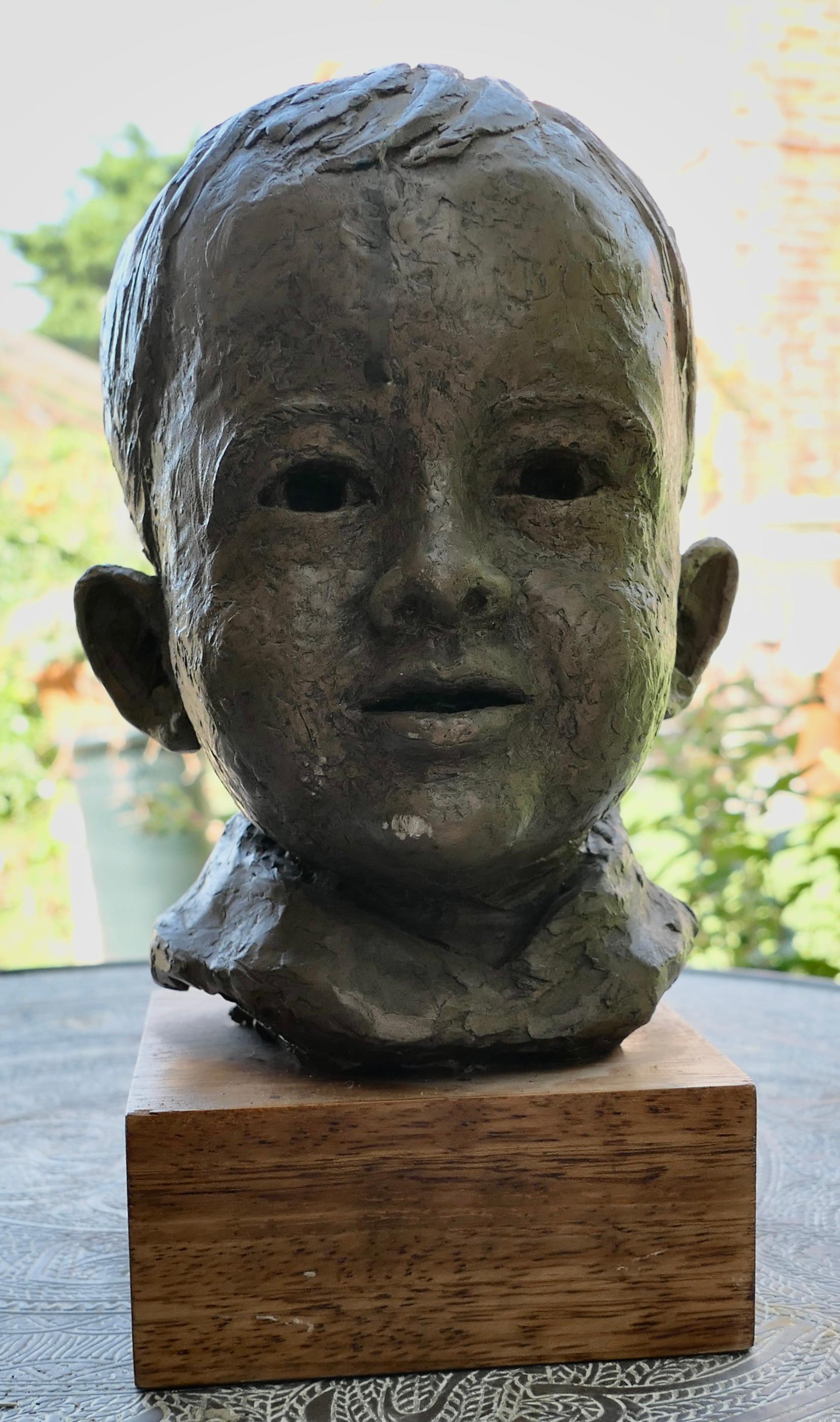 Artist’s Model Bust of a Very Young Smiling Boy, signed and dated

This is a very attractive hand made piece dating from the middle of the 20th Century, it was discovered in an Art Studio during refurbishment 

It is a three dimensional head made in