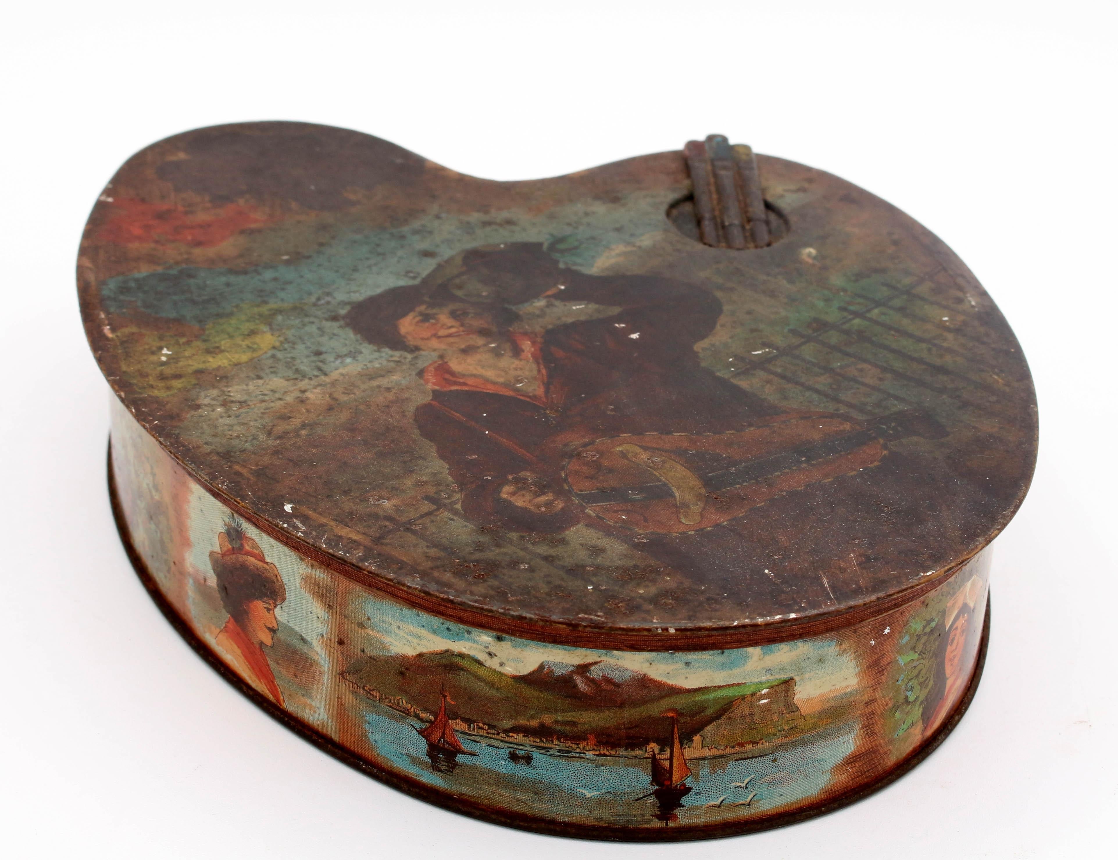 A wonderful & very rare Huntley & Palmer's Biscuit Tin in the form of an Artist's Pallette. We have never seen this example in England and, in fact, discovered it in the South of France.
