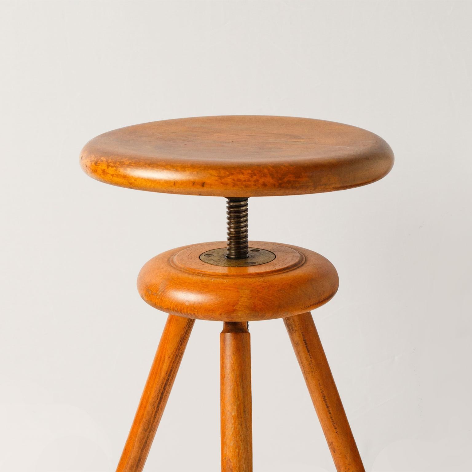 Artists stool (circa 1930-1950). Wood and iron construction. Sold, sturdy with an adjustable seat.