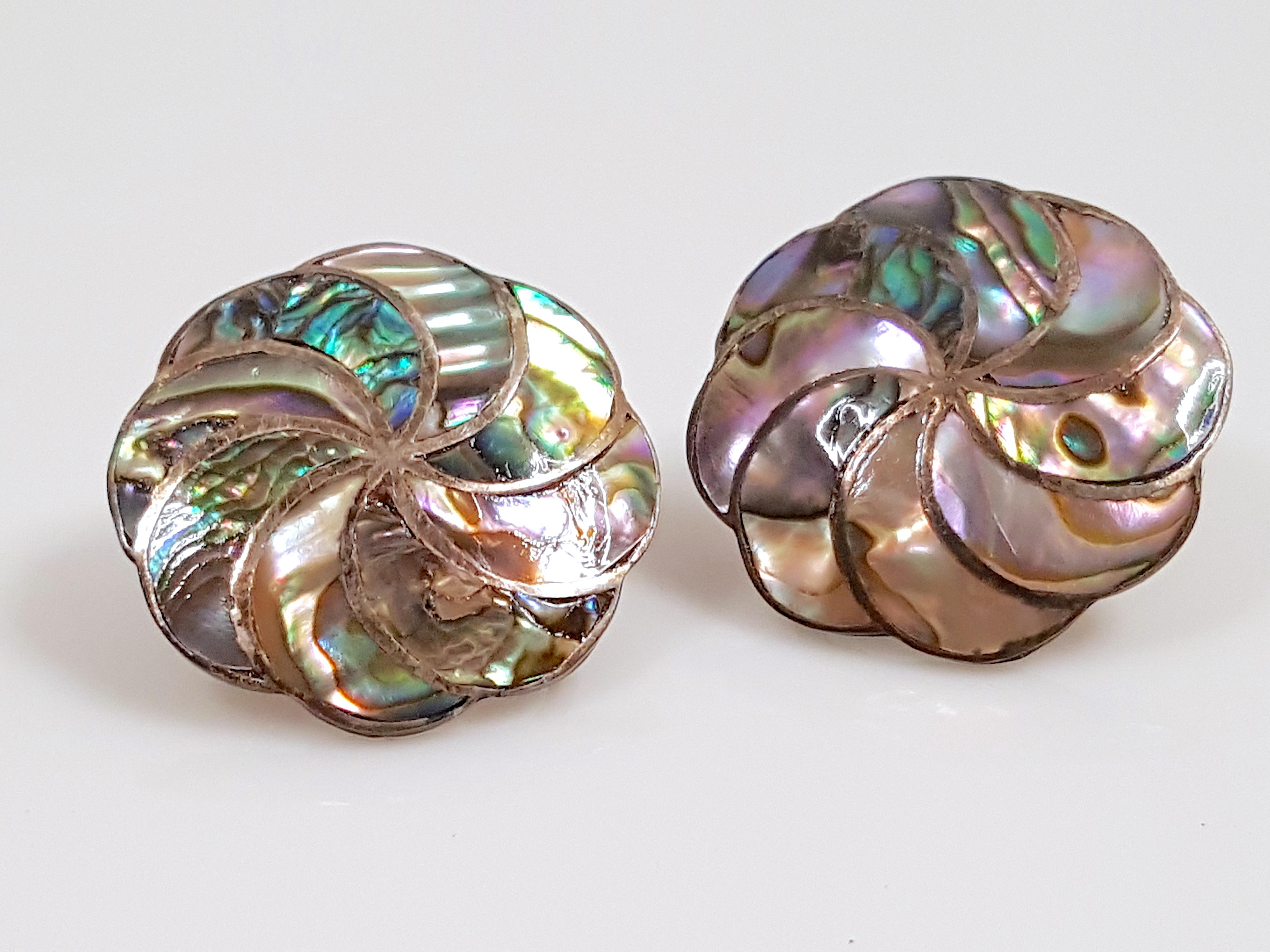 These signed antique Art-Nouveau period abalone shell sterling-silver screw-back earrings carry the maker's mark and initials of Dutch A.S. Agsteribbe, who worked in Amsterdam in The Netherlands in the early 20th Century. The mother-of-pearl is