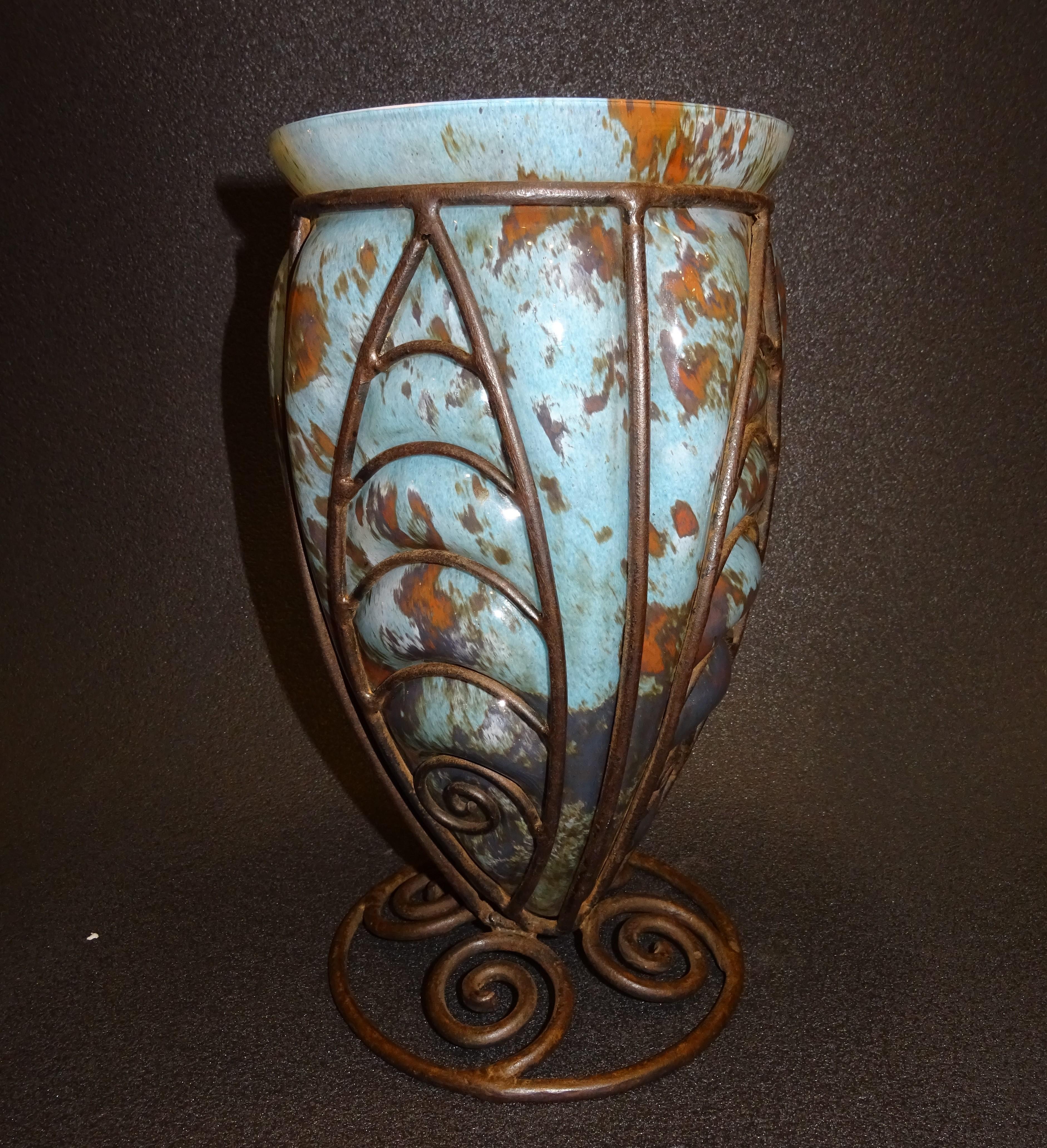 Amazing and beautiful French Art nouveau blue and brown Blownglass and forging Vase, from the Art Nouveau Nancy school, France.
A refined and delicate piece for artcollector or artlover, suitable in any space. Piece unique
The Nancy school was one
