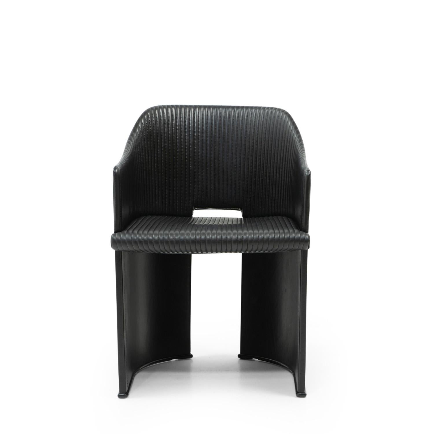 The Artona 8551 arm chair by Afra and Tobia Scarpa was produced by Maxalto Italy in the early 1980s, it is part of the iconic Artona collection collection (also known for the Africa Chair). 

The Scarpa couple’s designs are renowned for their