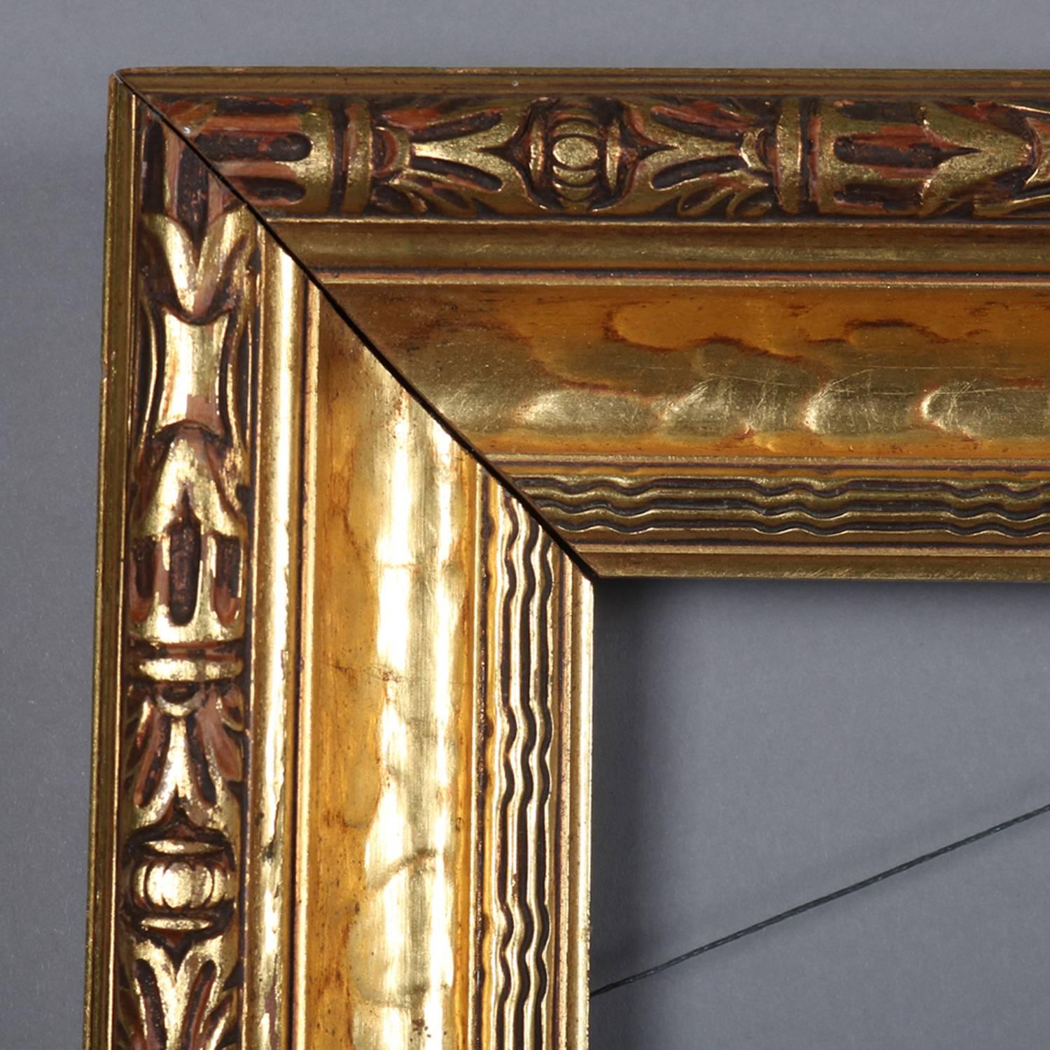 Arts & crafts style carved gold gilt wood art or mirror frame features modeled finish with carved foliate outer border and lined inner border; for artwork, picture, painting or mirror; 20th century

***DELIVERY NOTICE – Due to COVID-19 we are