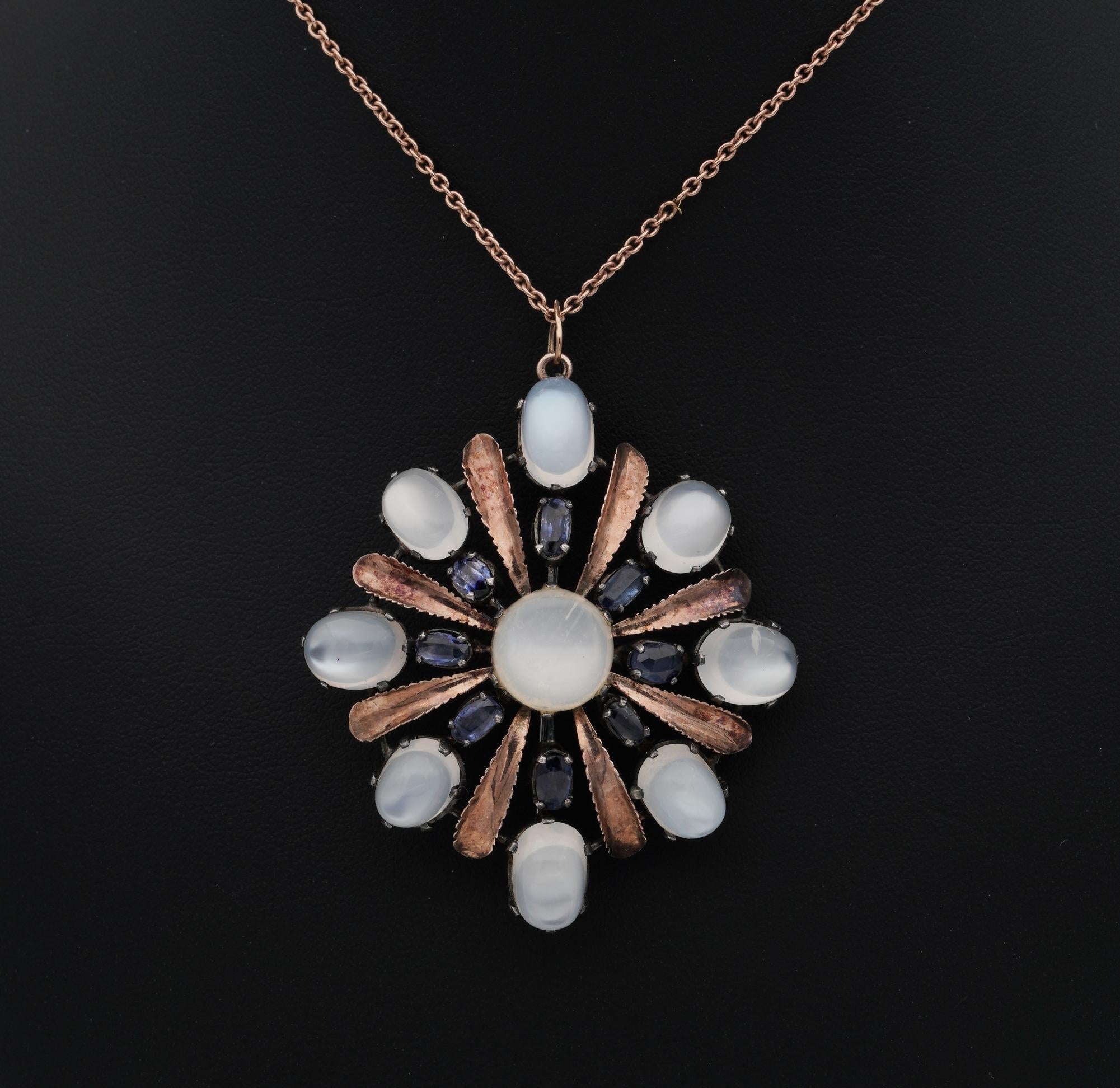 Mesmerizing Moonstones

Arts & Crafts large pendant brooch crafted of solid silver with 9KT solid rose gold details – not marked
Fantastic stylized design looks stunning worn either as brooch or as pendant as well
Crafted with fine details and