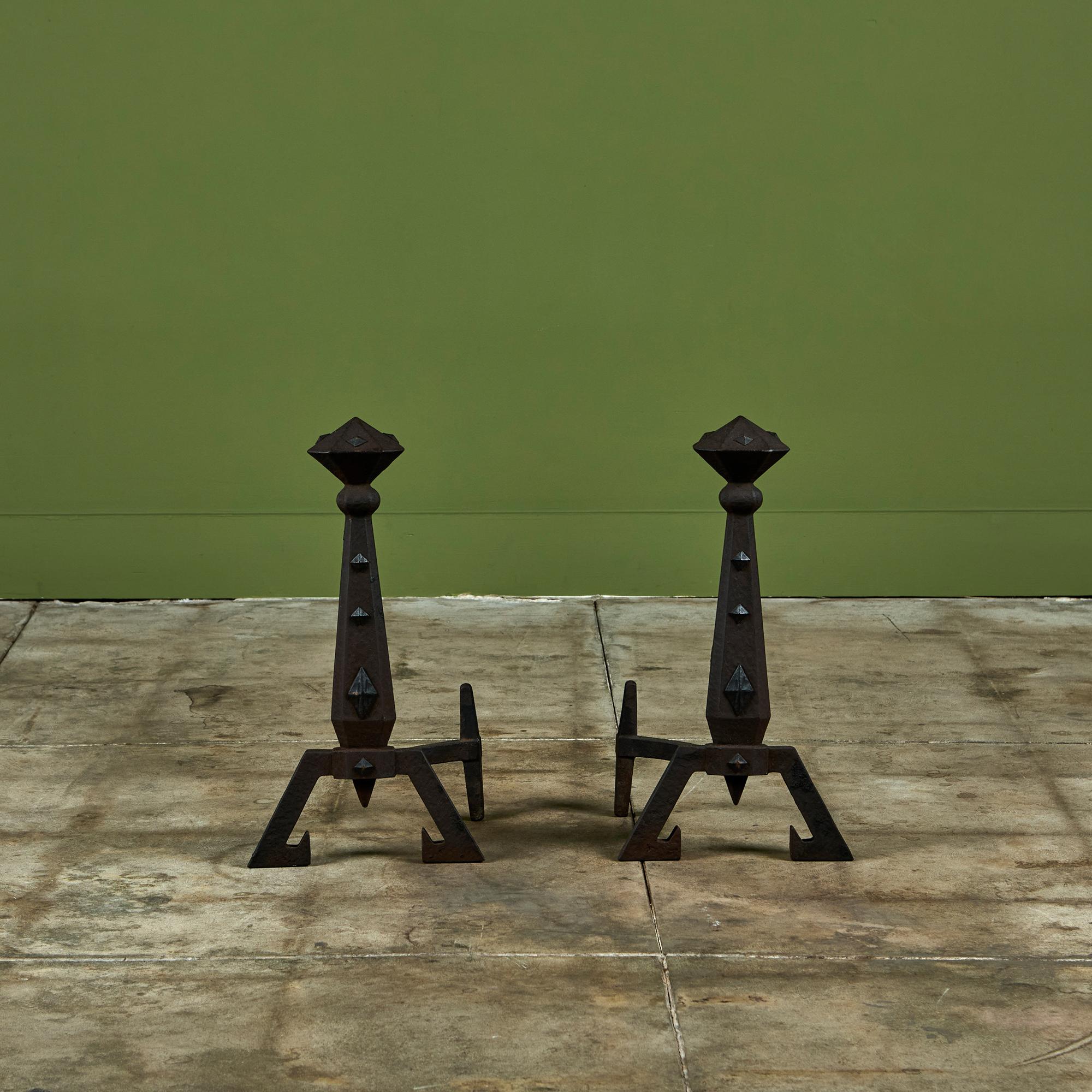 Pair of cast iron andirons featuring brass diamond accents.

Dimensions
11