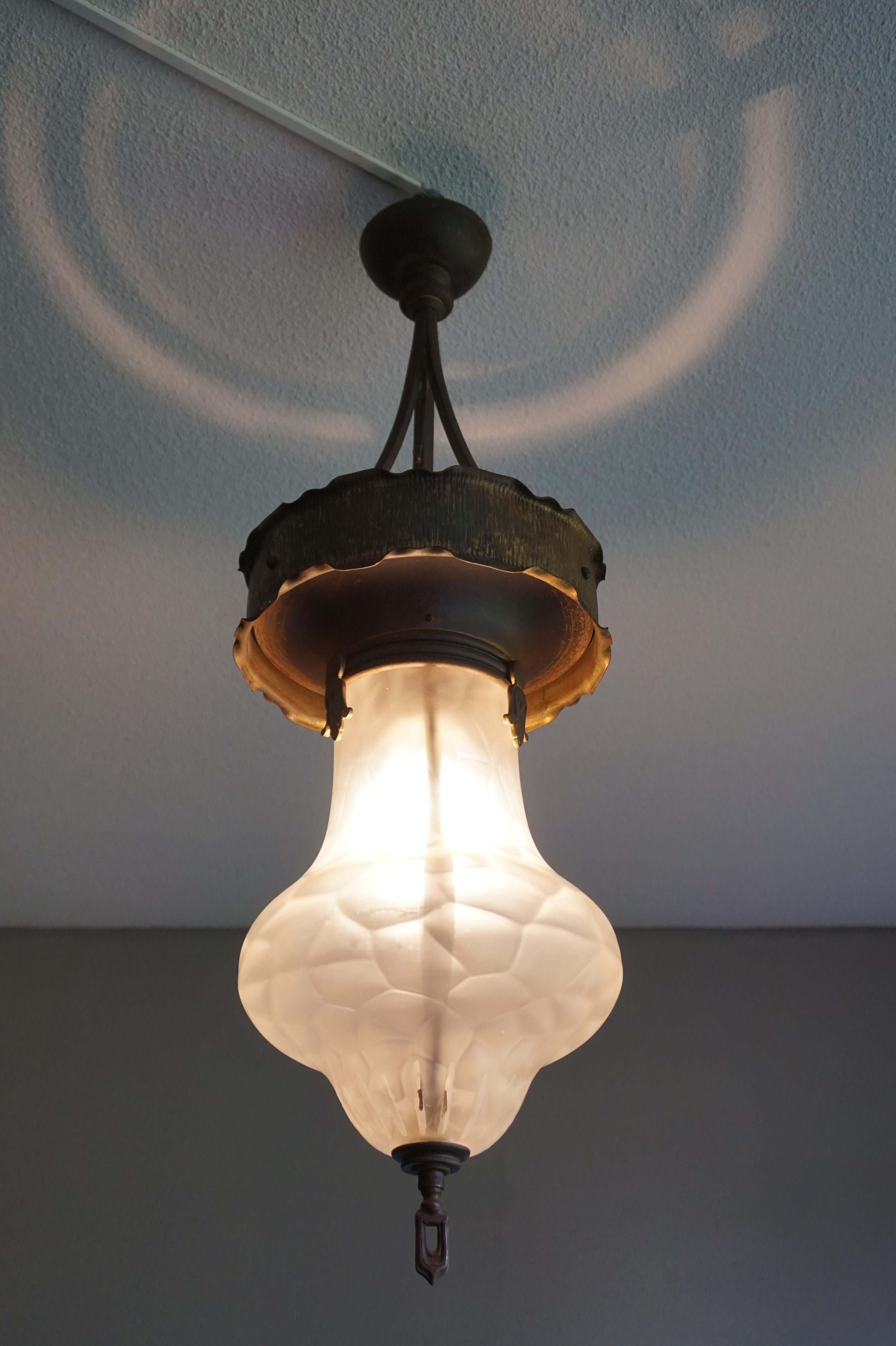 Stunning and all handcrafted hallway pendant light for the collectors of rare and beautiful.

With this striking light fixture being a former gas operated light, this certainly is one of the earliest Arts & Crafts fixtures that we ever had the
