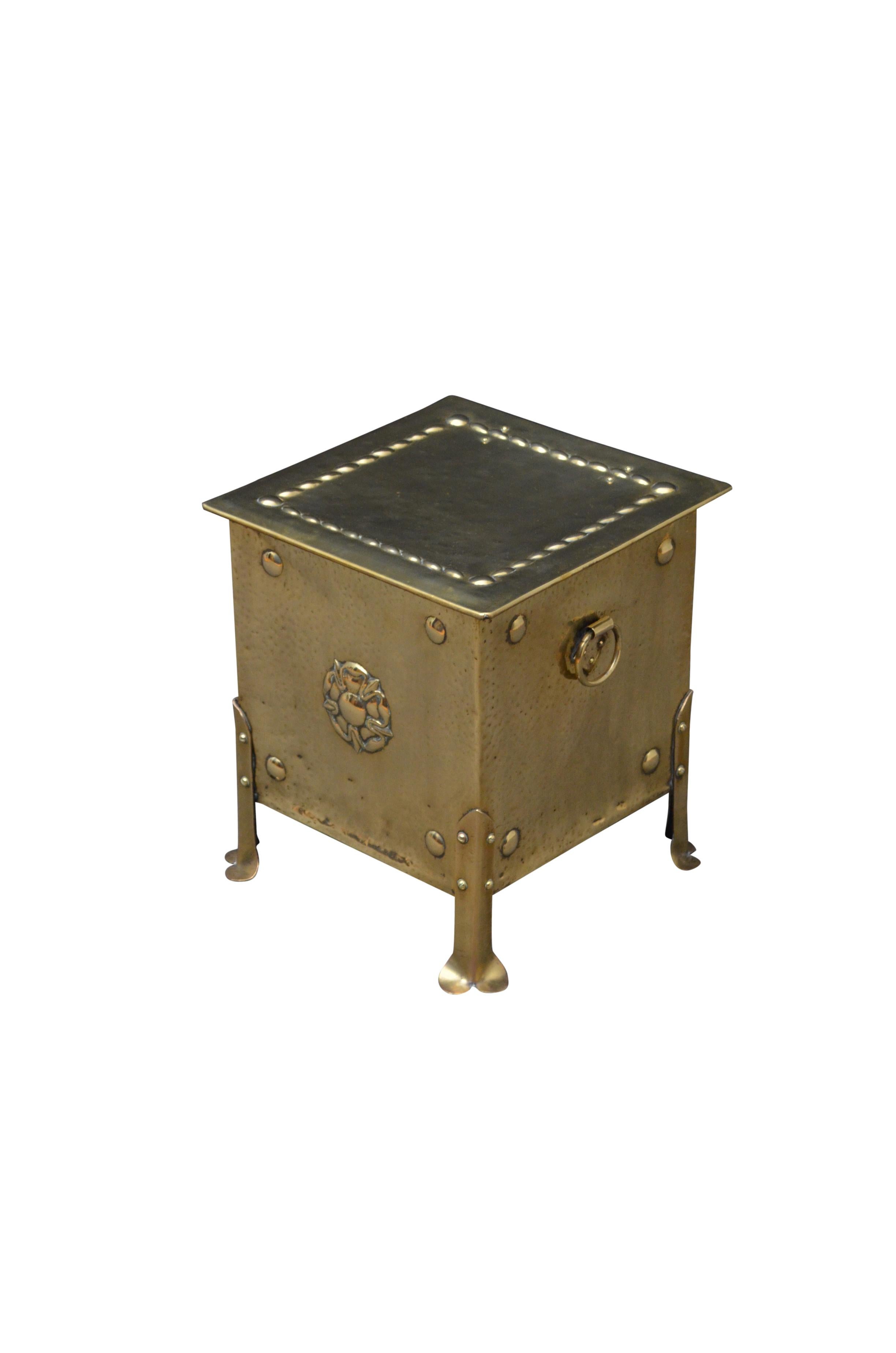 Arts & Crafts coal bin with embossed decoration, carrying handles and pad feet. This antique coal scuttle would make a goo planter. c1900
Measures: H 14