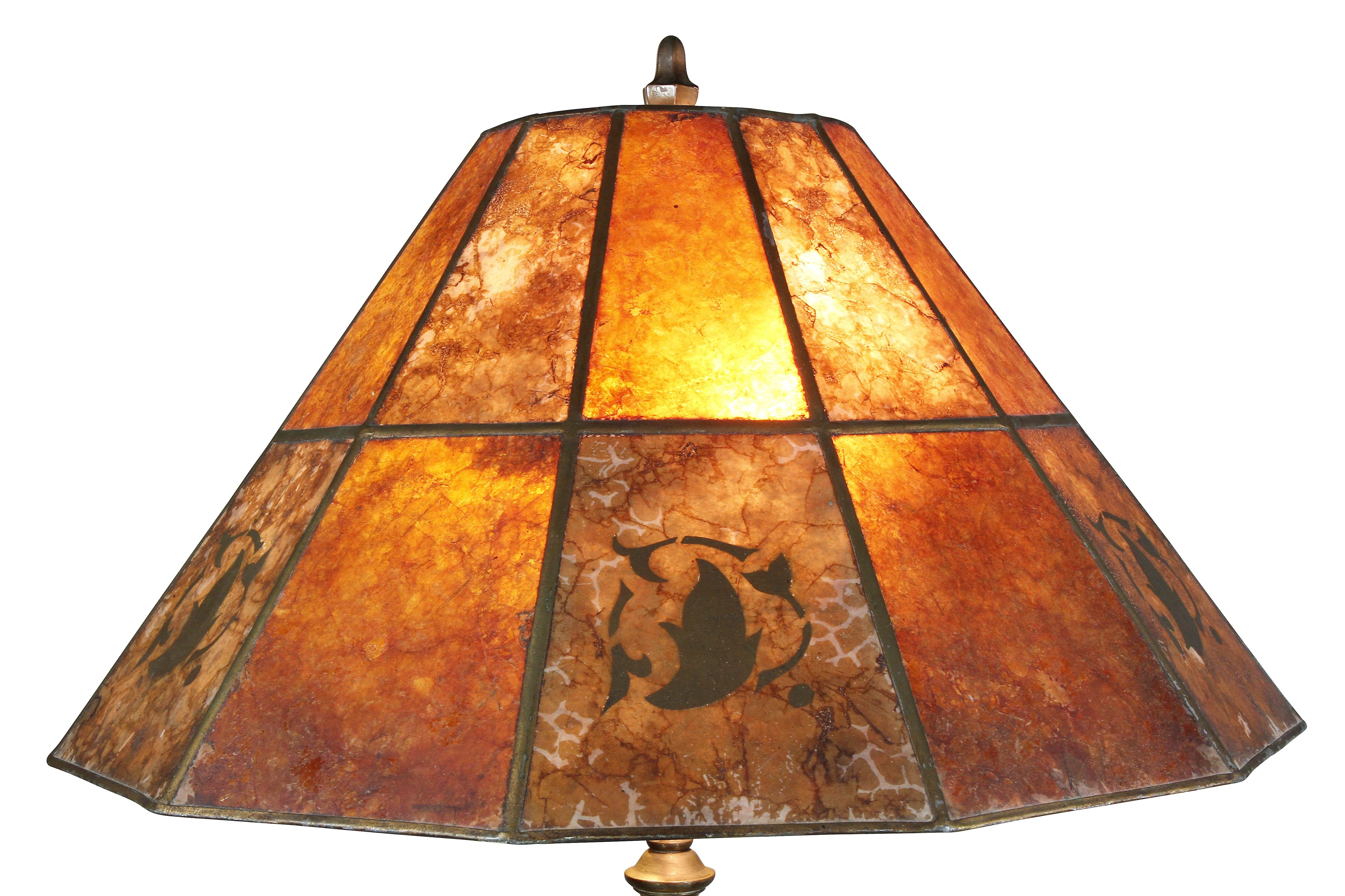 With conical shade and two-light fixture, square section support and square base with ball and claw feet.