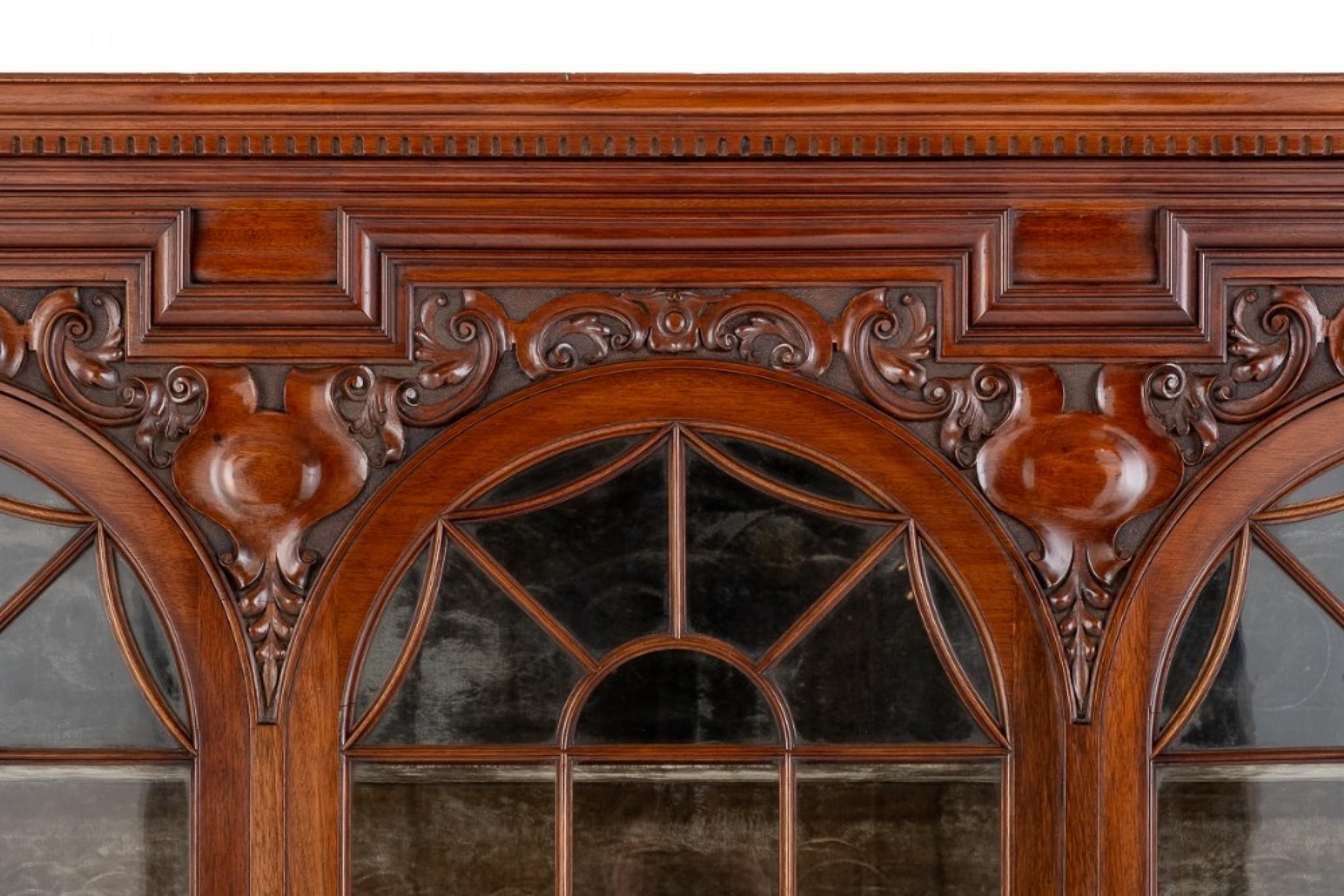 Mahogany Arts and Crafts side cabinet.
This quality piece stands upon cabriole front legs with carved shells to the knees.
circa 1890
The piece features an under tray with a panelled back.
The frieze of the side cabinet having carved scrolls and