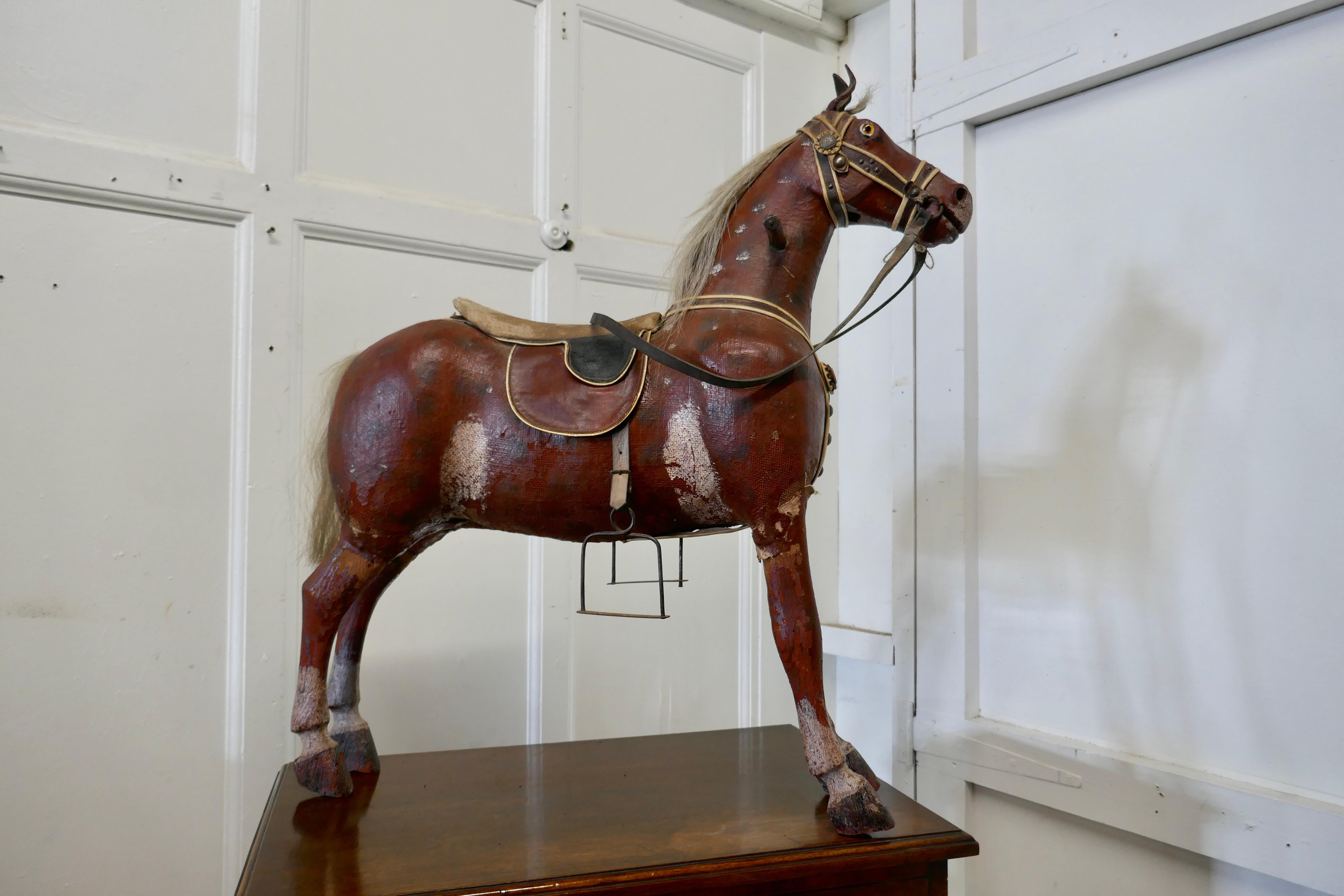 Arts & Crafts Canvas Toy Model of a Horse

This hansom beast is free standing and would very likely have been originally bought for a children’s room
The condition is entirely original and unrestored, so he has a little distressing on his canvas