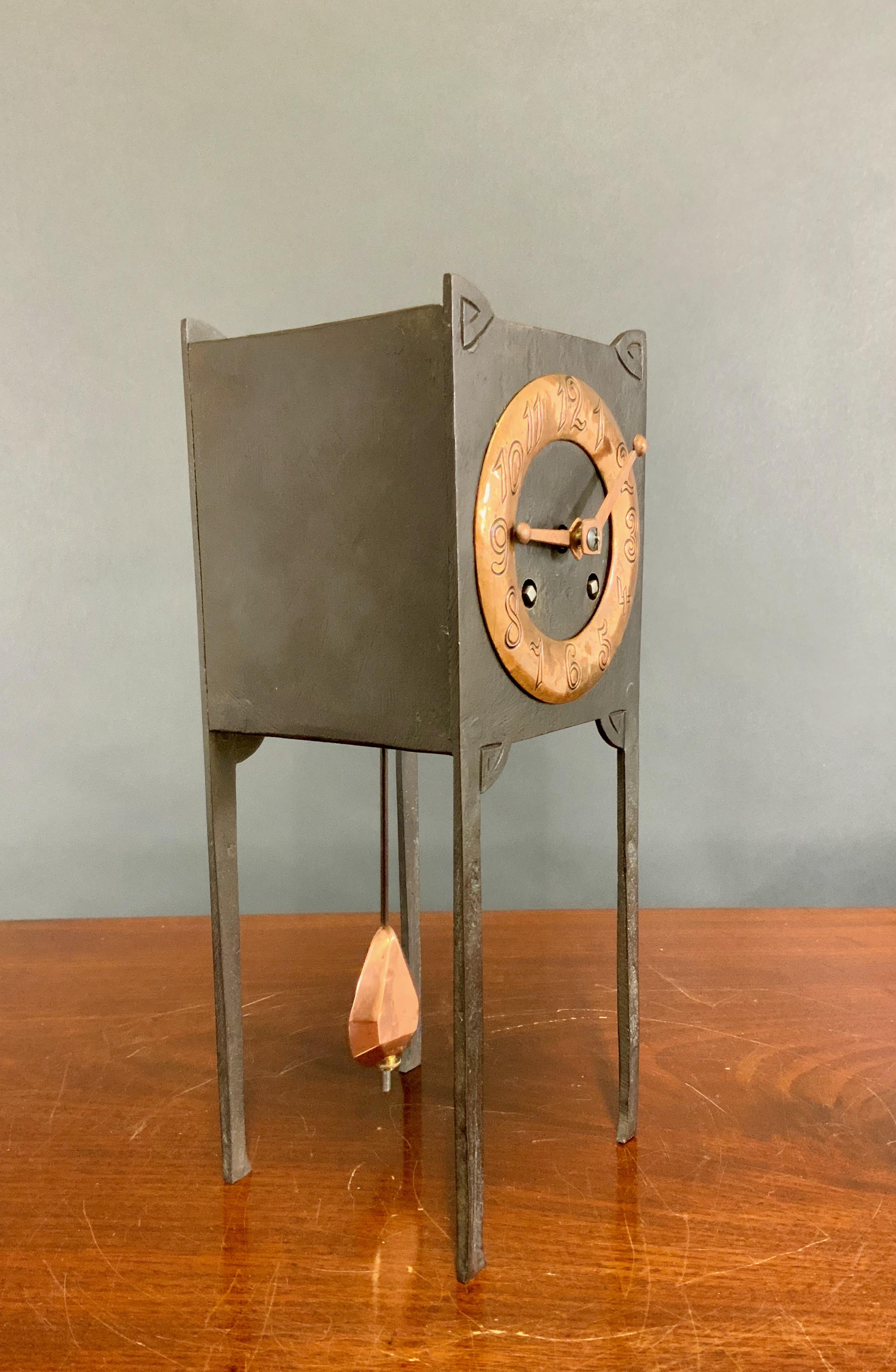 Early 20th Century Arts and Crafts Cast Iron and Copper Mantel Clock For Sale