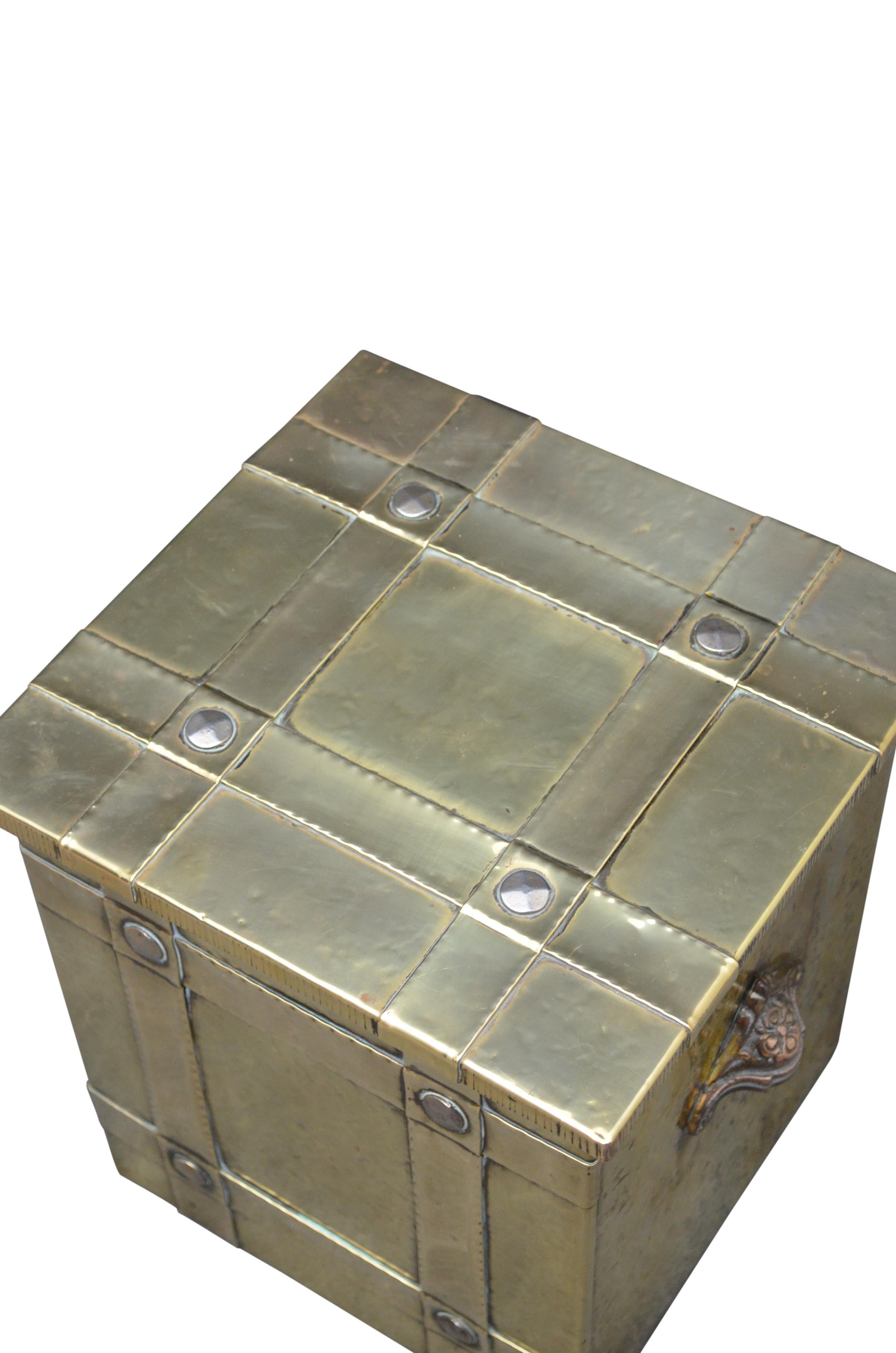 Substantial Arts and Crafts coal bin in brass with original lined and carrying handles. C1900
Measures: H 15” W 13.5” D 13”
H 38cm W 35cm D 33cm.