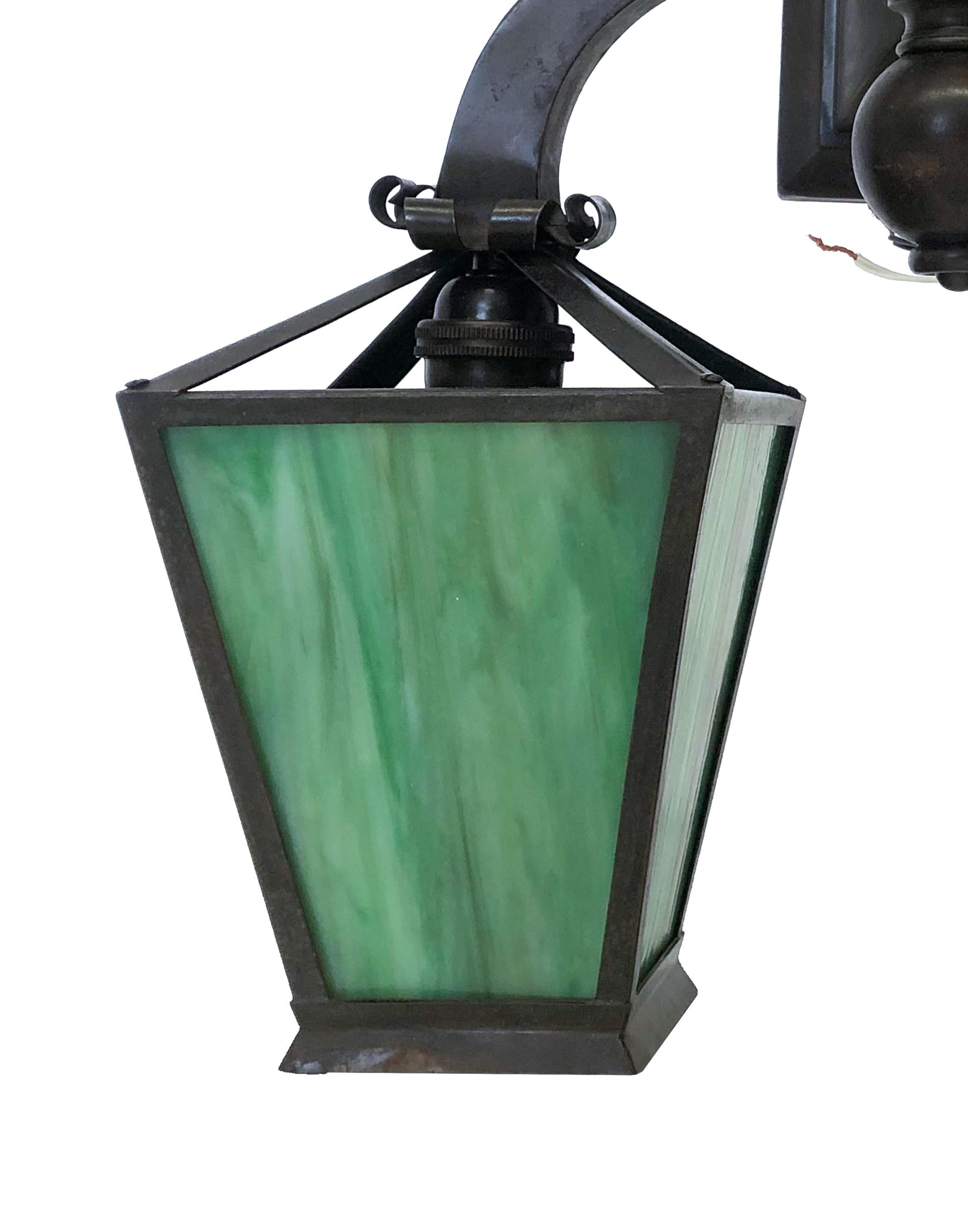 Metalwork Arts and Crafts Double Light Brass Sconce with Marbled Green Glass Pannels For Sale