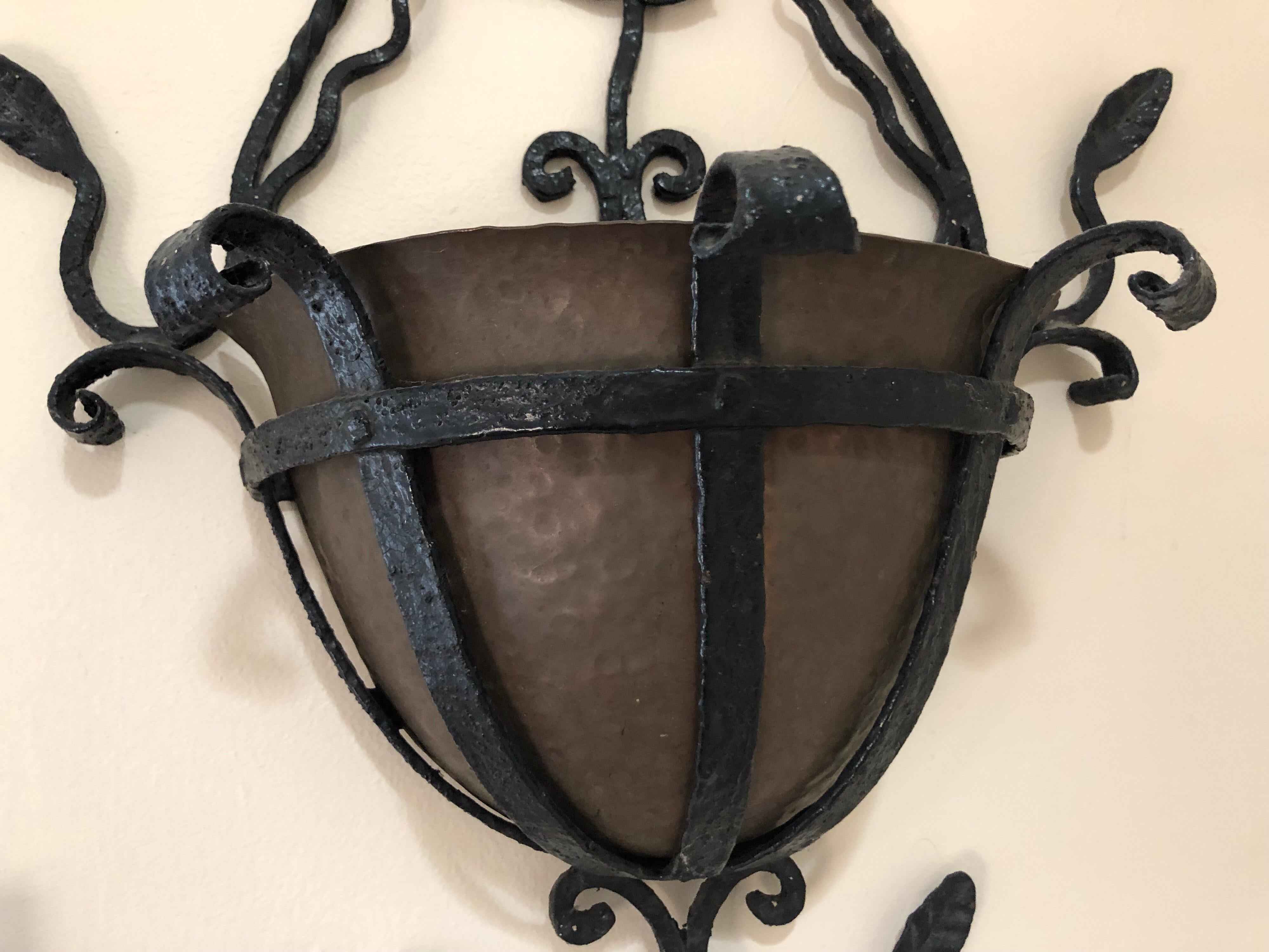large wrought iron wall planters