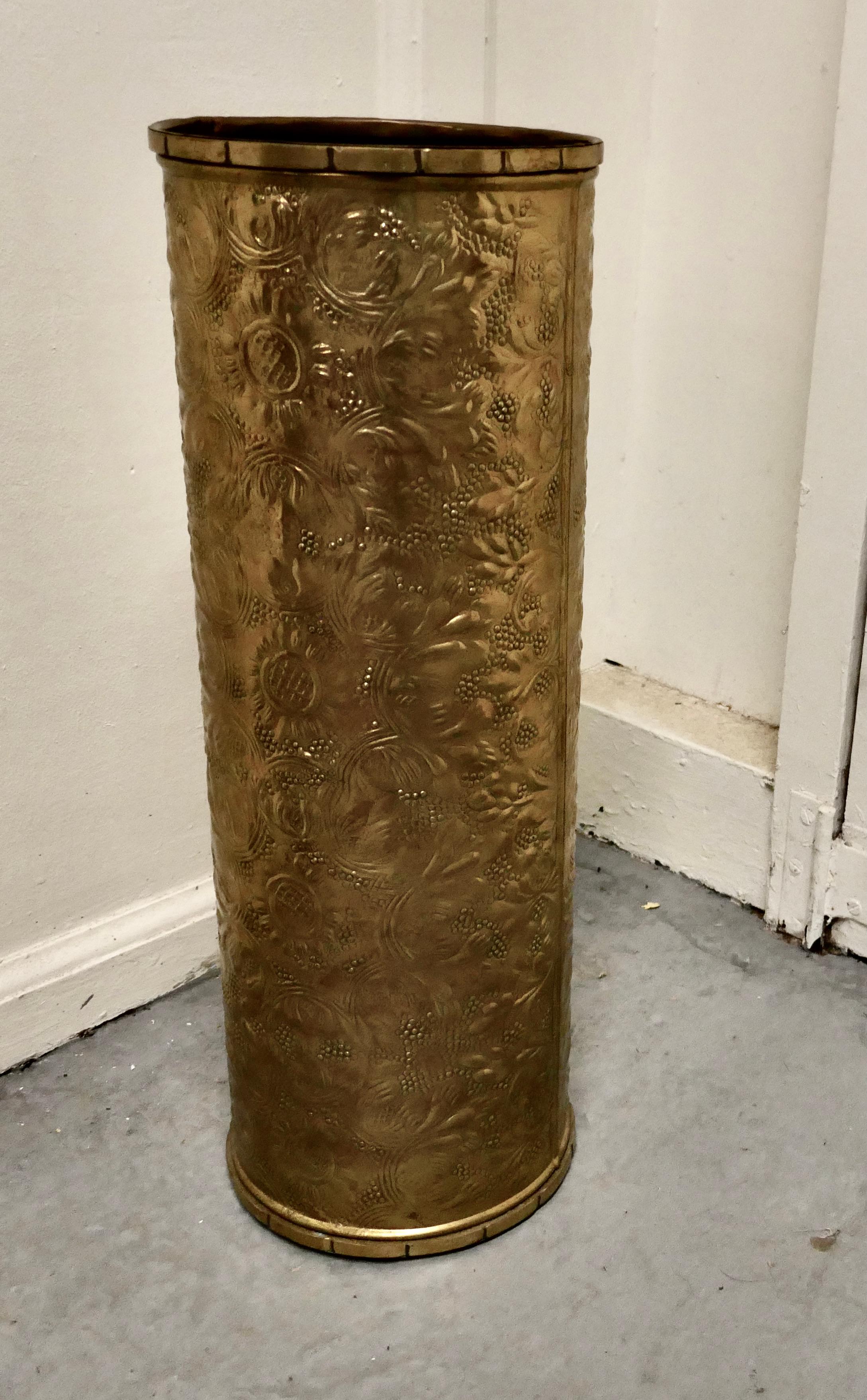 Arts & Crafts embossed brass stick stand, umbrella stand

This good looking piece it is round in shape with stylized flowers and leaves embossed all-over. 
The stick stand is in excellent condition, it is 20” high and 7” in diameter 
GB371.