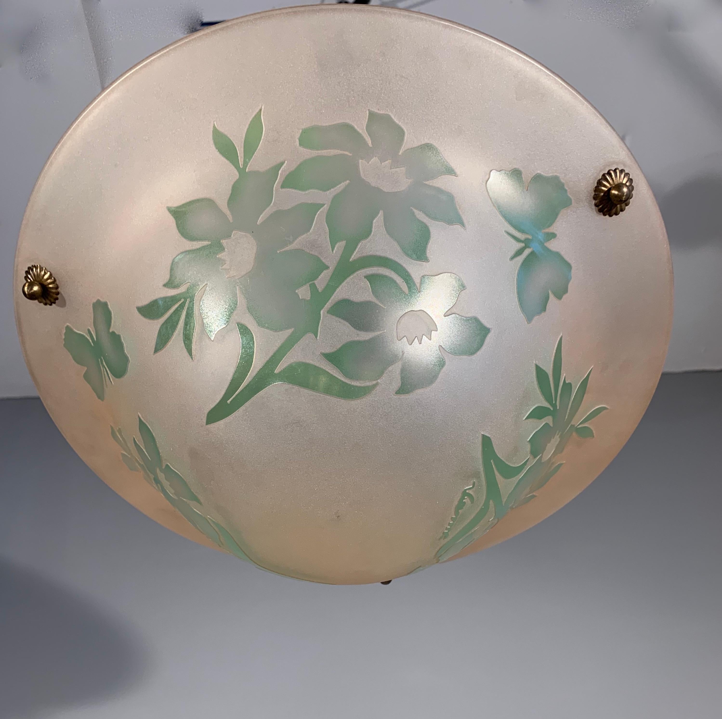 Unique and stunning work of lighting art.

If you are passionate about early 20th century decorative art then you will love this one of a kind, art glass light fixture. What you are seeing here is an extremely rare, acid etched pendant, signed by