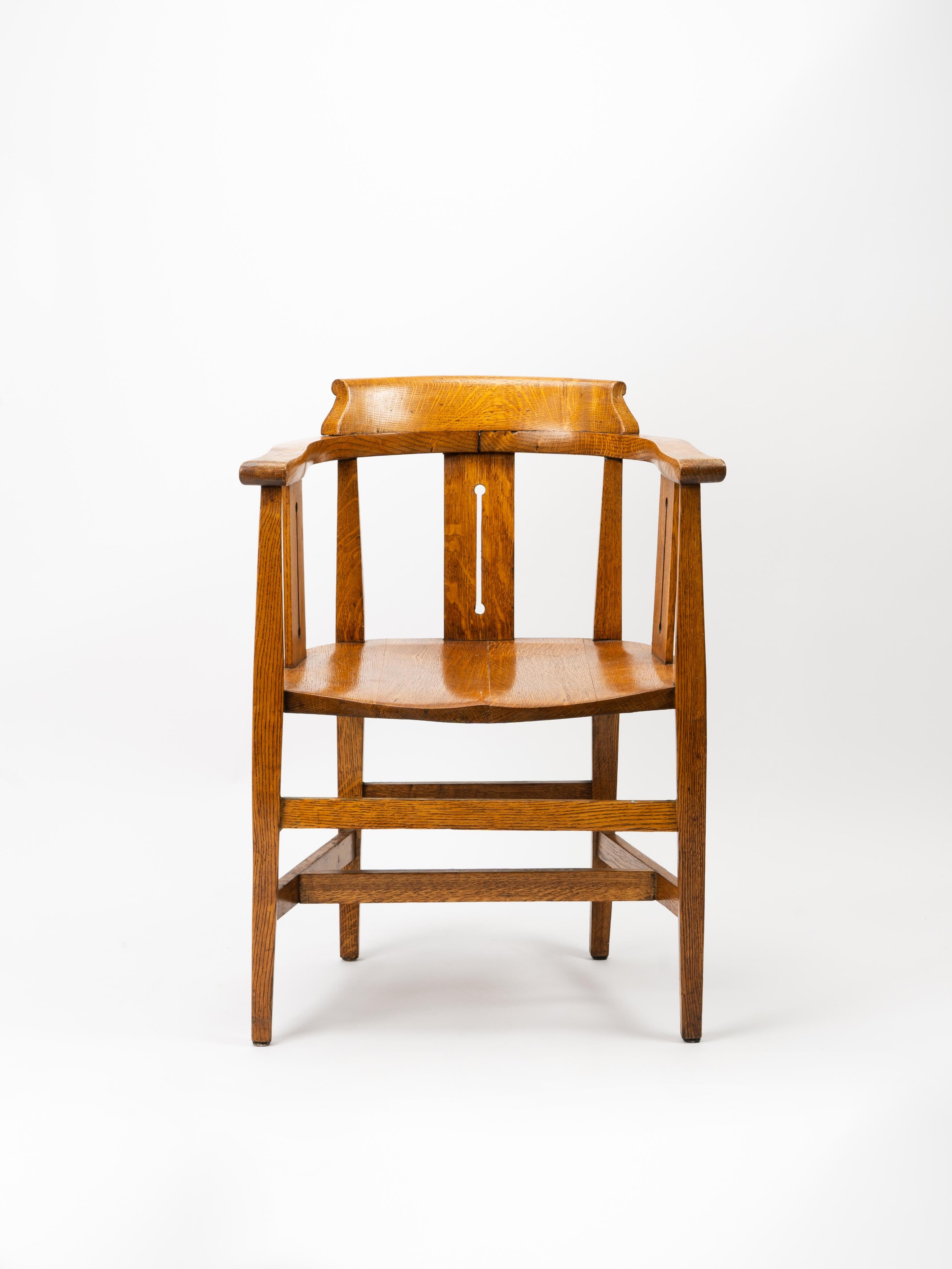 Arts & Crafts mastery abounds in these classic English oak armchairs by Shapland & Petter, out of England. The peg joinery and hand carved oak is a masterclass in traditional woodworking.

The finish on these chairs are a beautiful medium oak color,
