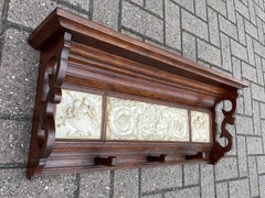 Arts and Crafts Era Coat Rack with Detailed and Deeply Carved Alabaster Tiles
