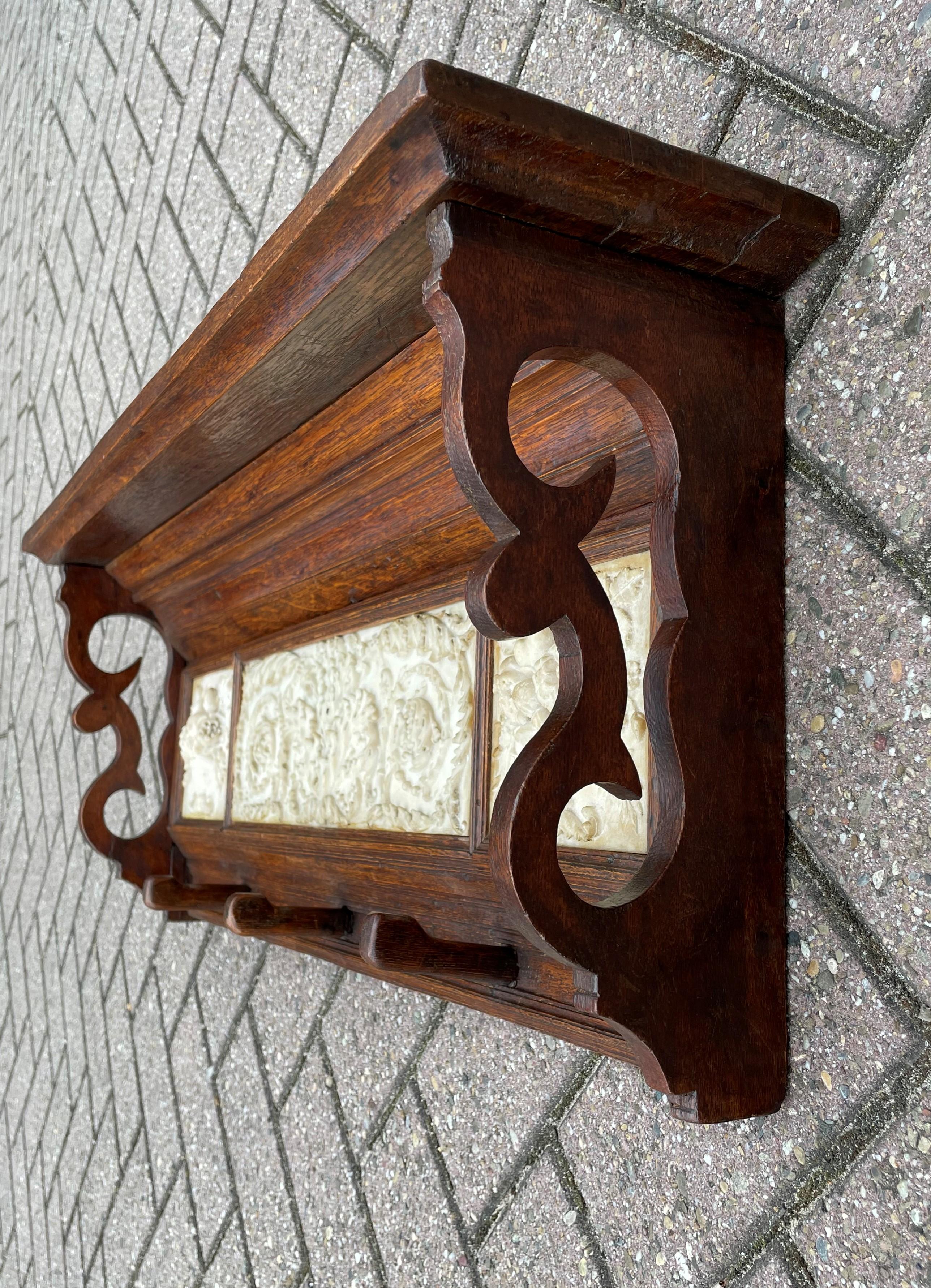 20th Century Arts and Crafts Era Coat Rack with Detailed and Deeply Carved Alabaster Tiles For Sale