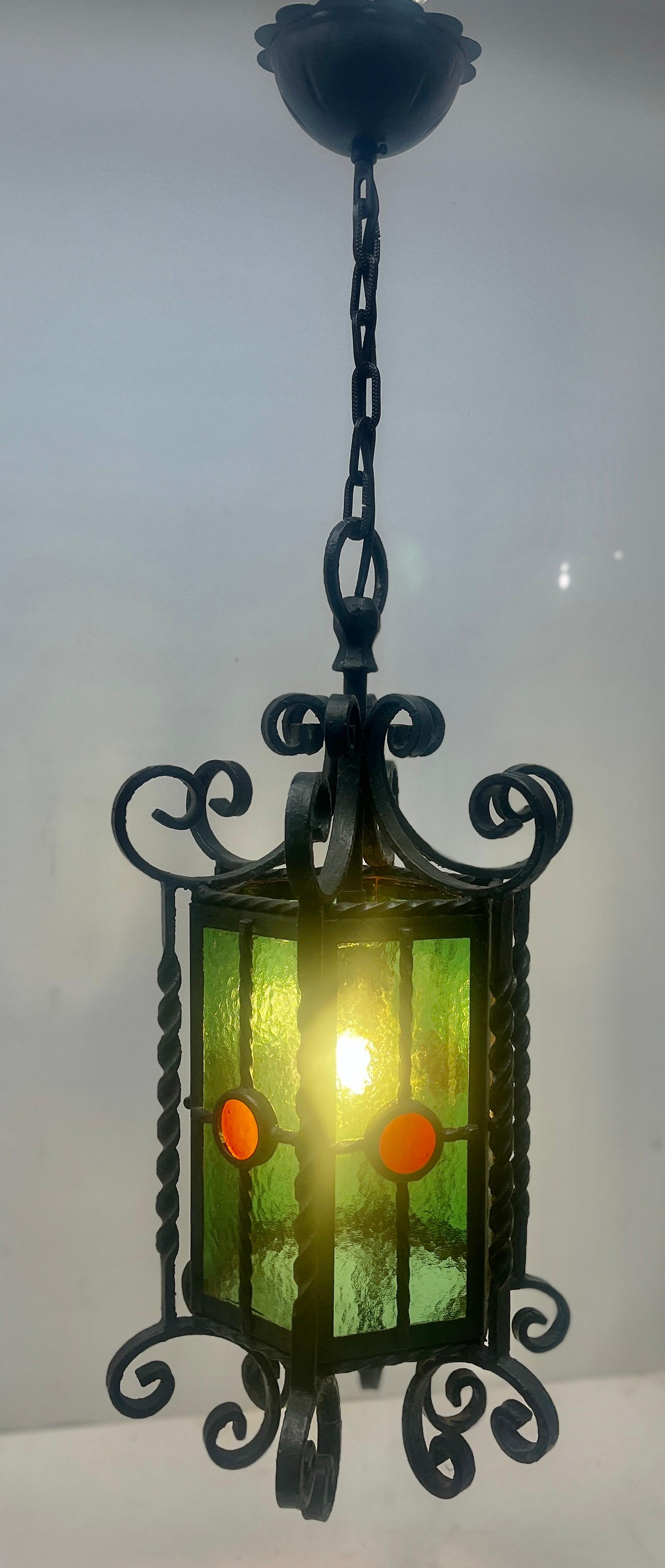 Hand-Crafted Arts & Crafts Forget and Colored Glass Pendant Lobby Lamp, 1930s For Sale
