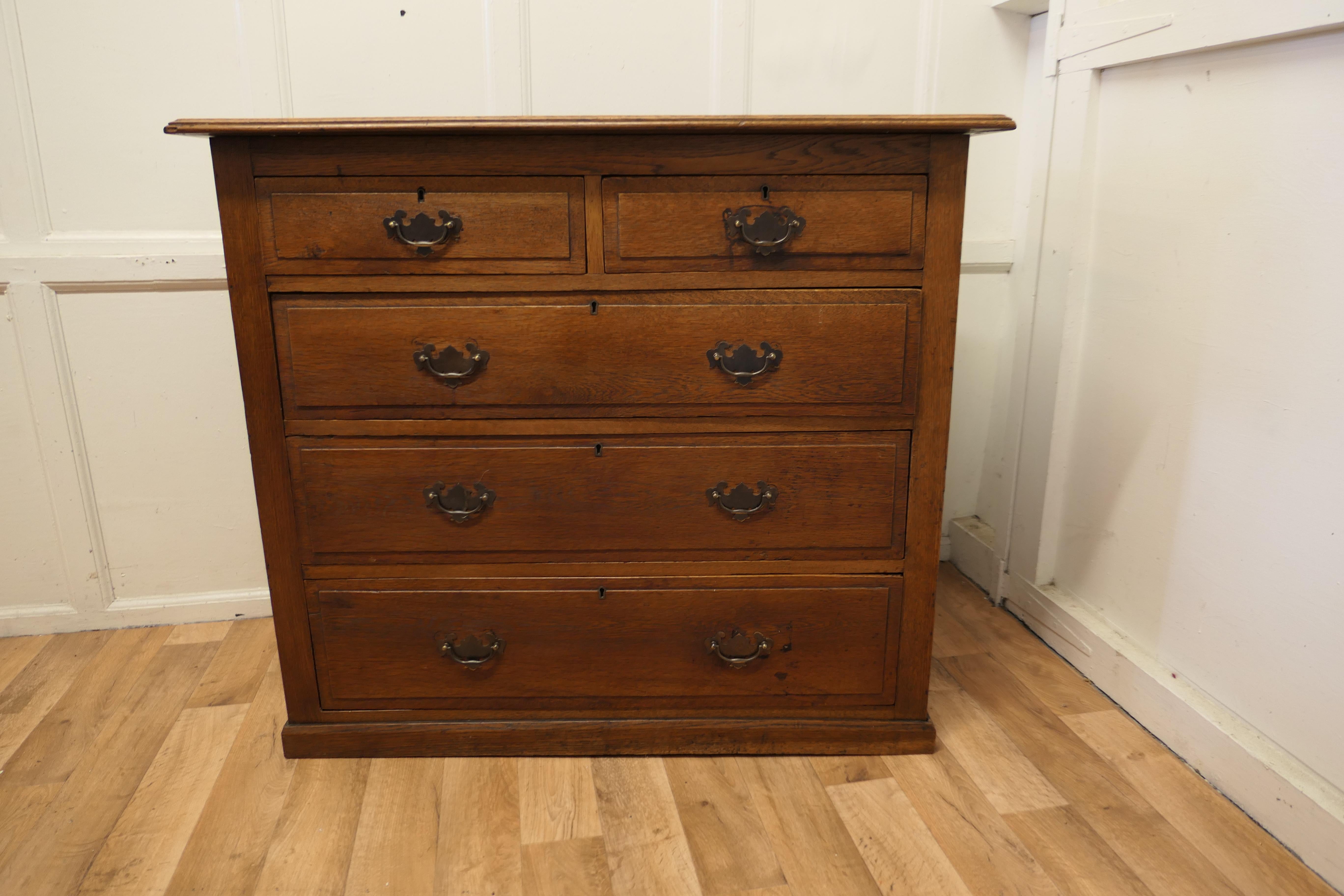 Arts and crafts golden oak chest of drawers 

 This a good solid oak chest, the five drawer version like this one is becoming a lot more difficult to source these days, there are 2 short drawers over 3 graduated drawers 
The chest has a moulded