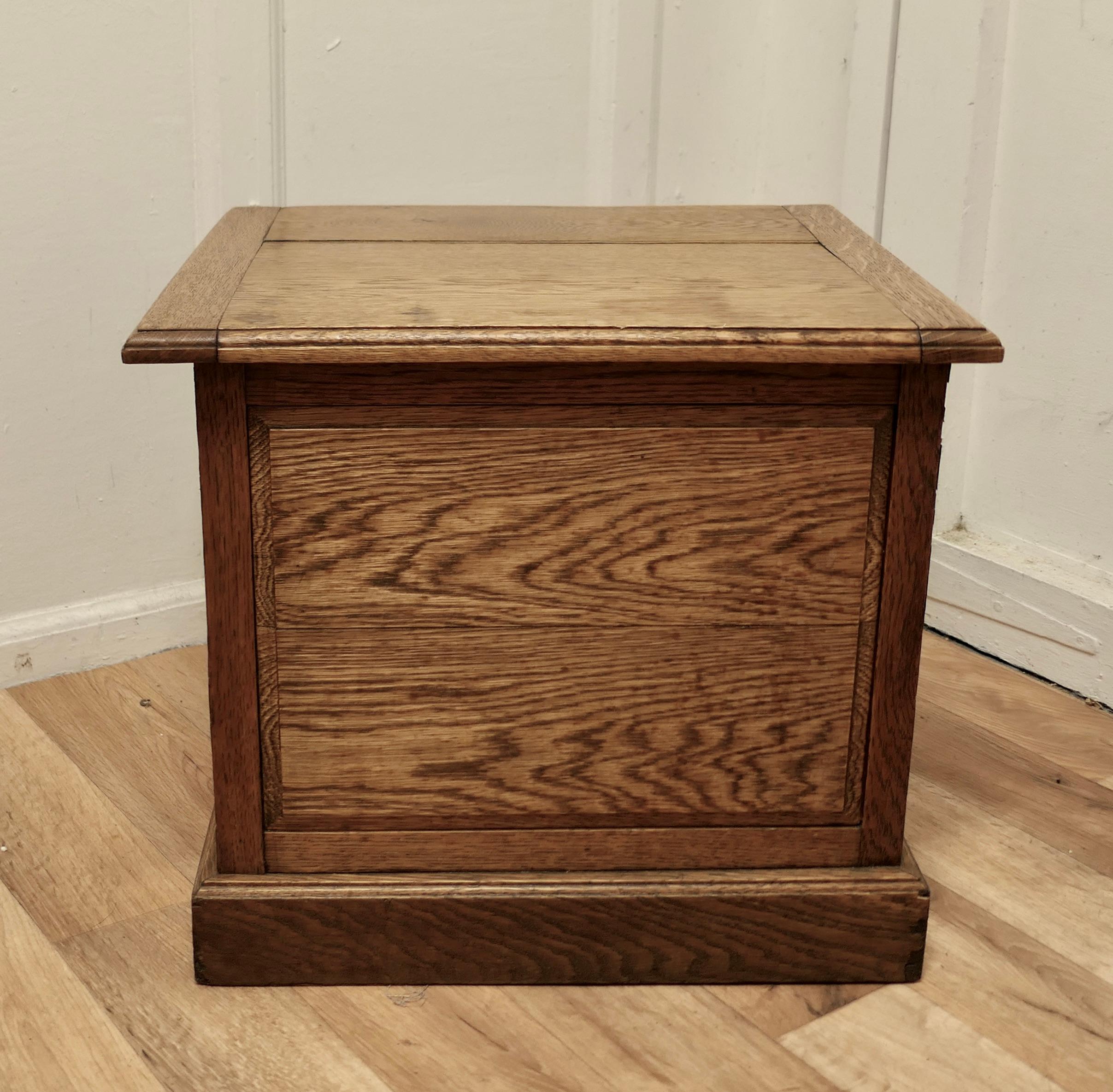Arts and Crafts Golden Oak Log Box, seat or occasional table

This is a good quality storage box, it is a good height for a fireside seat and would work well as a Log Storage Box as it is a good size 
The Box is 18” high, 20” long and 17.5 ”