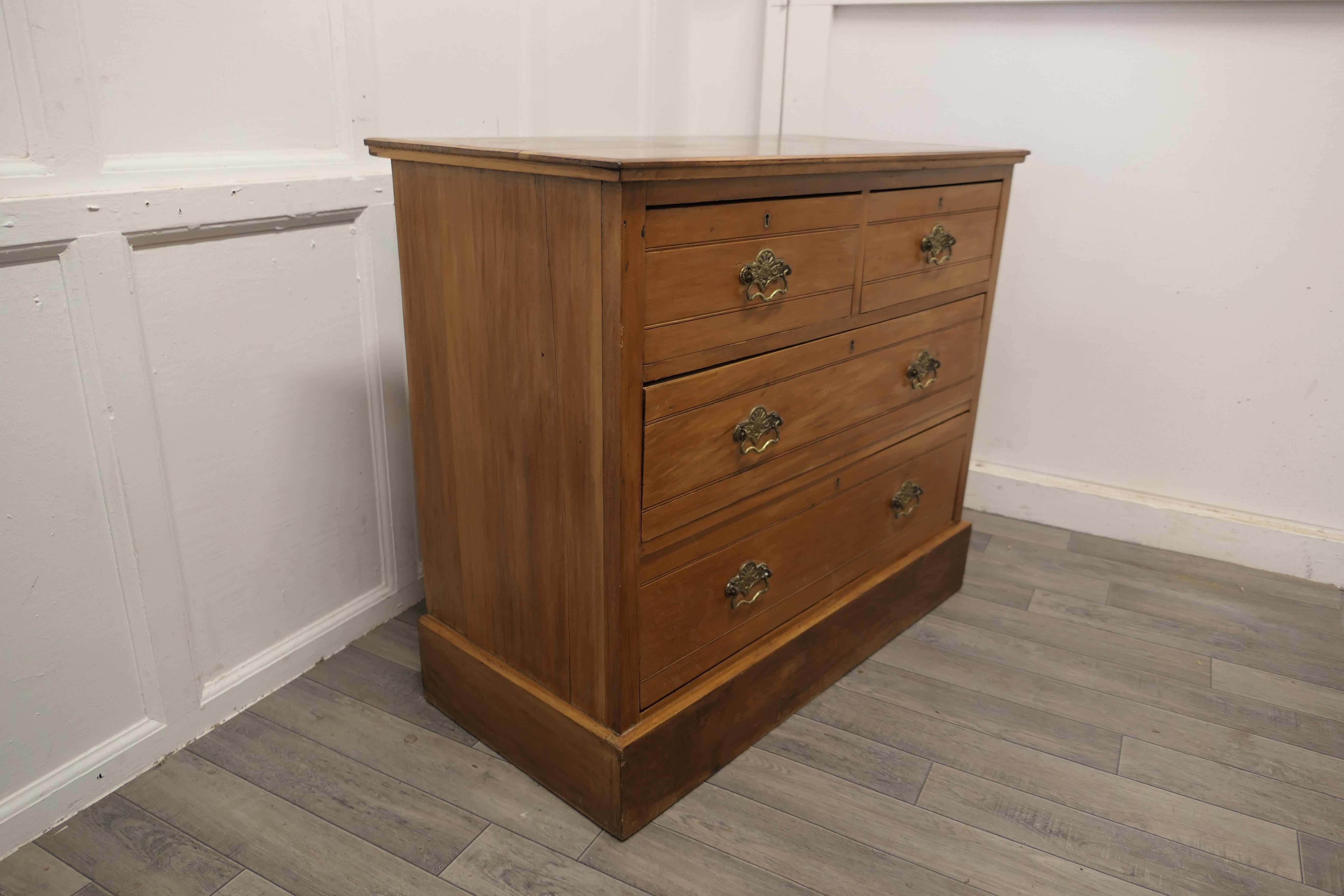 Late 19th Century Arts and Crafts Golden Walnut Chest of Drawers For Sale