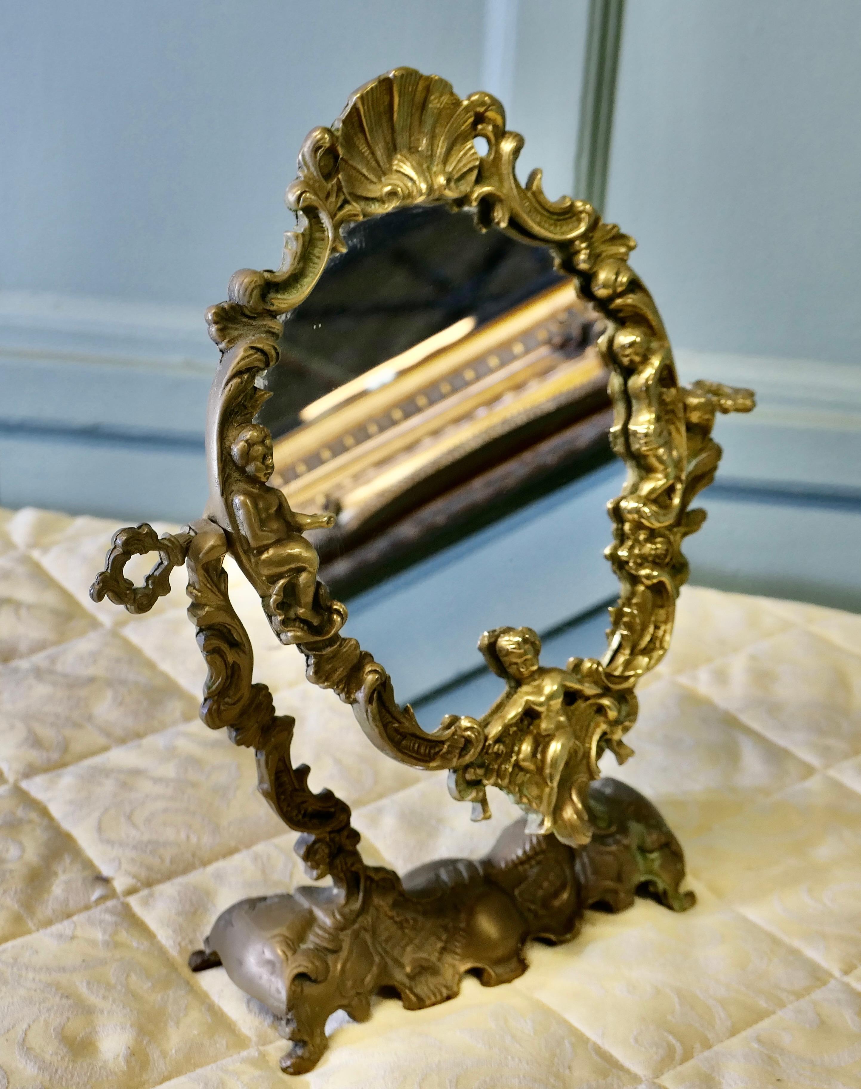 Early 20th Century Arts and Crafts Gothic Style Brass Mirror  A classic of its style For Sale