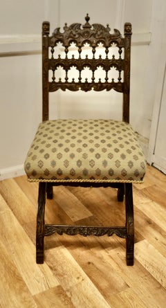 Arts and Crafts Gothic X Frame Carved Oak Chair