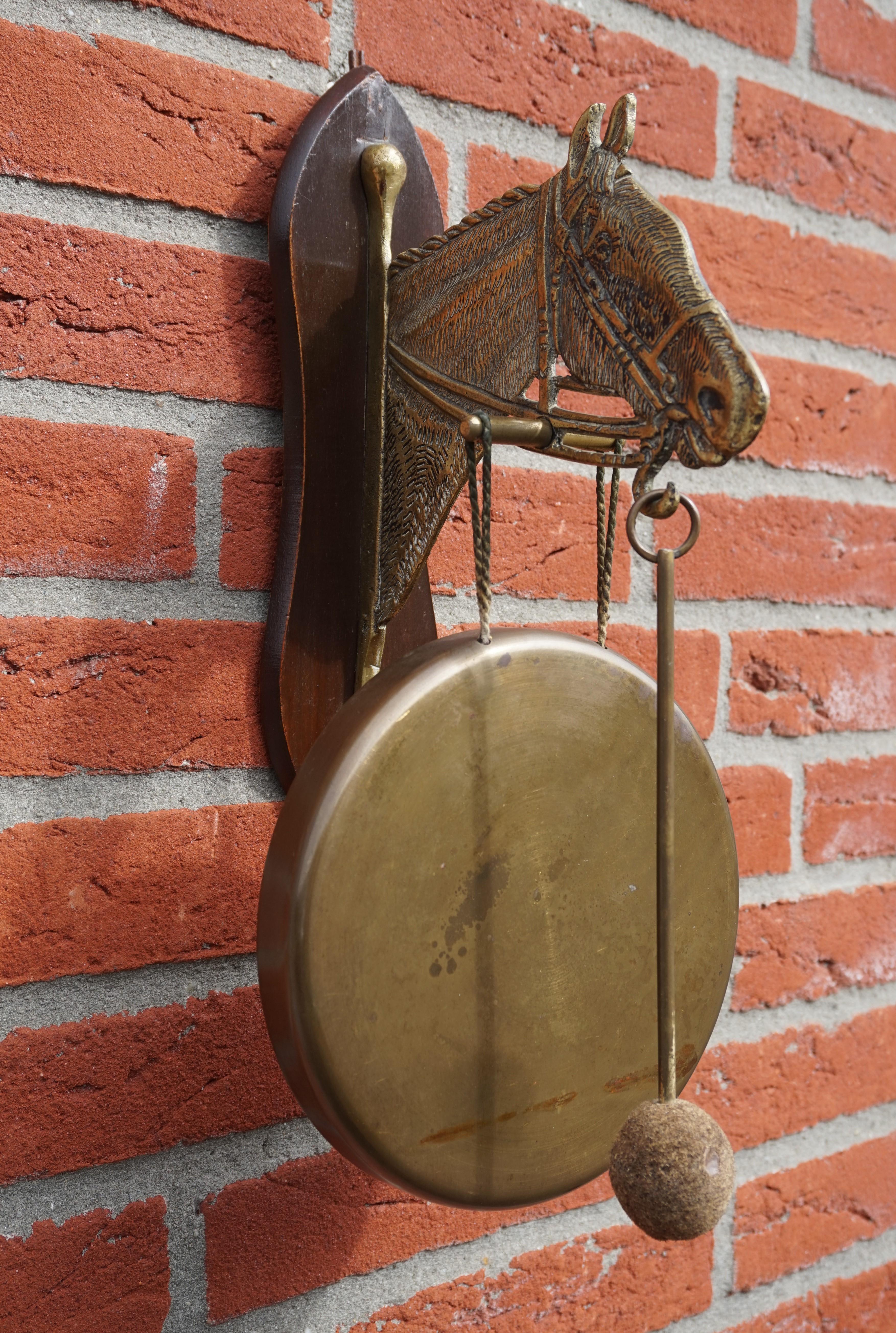 Very rare and striking (pun intended) Arts & Crafts gong.

This totally original house gong with a horse sculpture even comes with the original and working condition striker. The beautifully handcrafted horse and gong are a real joy to look at and