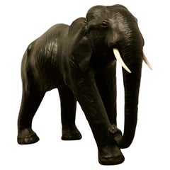 Vintage Arts and Crafts Leather Model of a Bull Elephant   This is a beautiful find  
