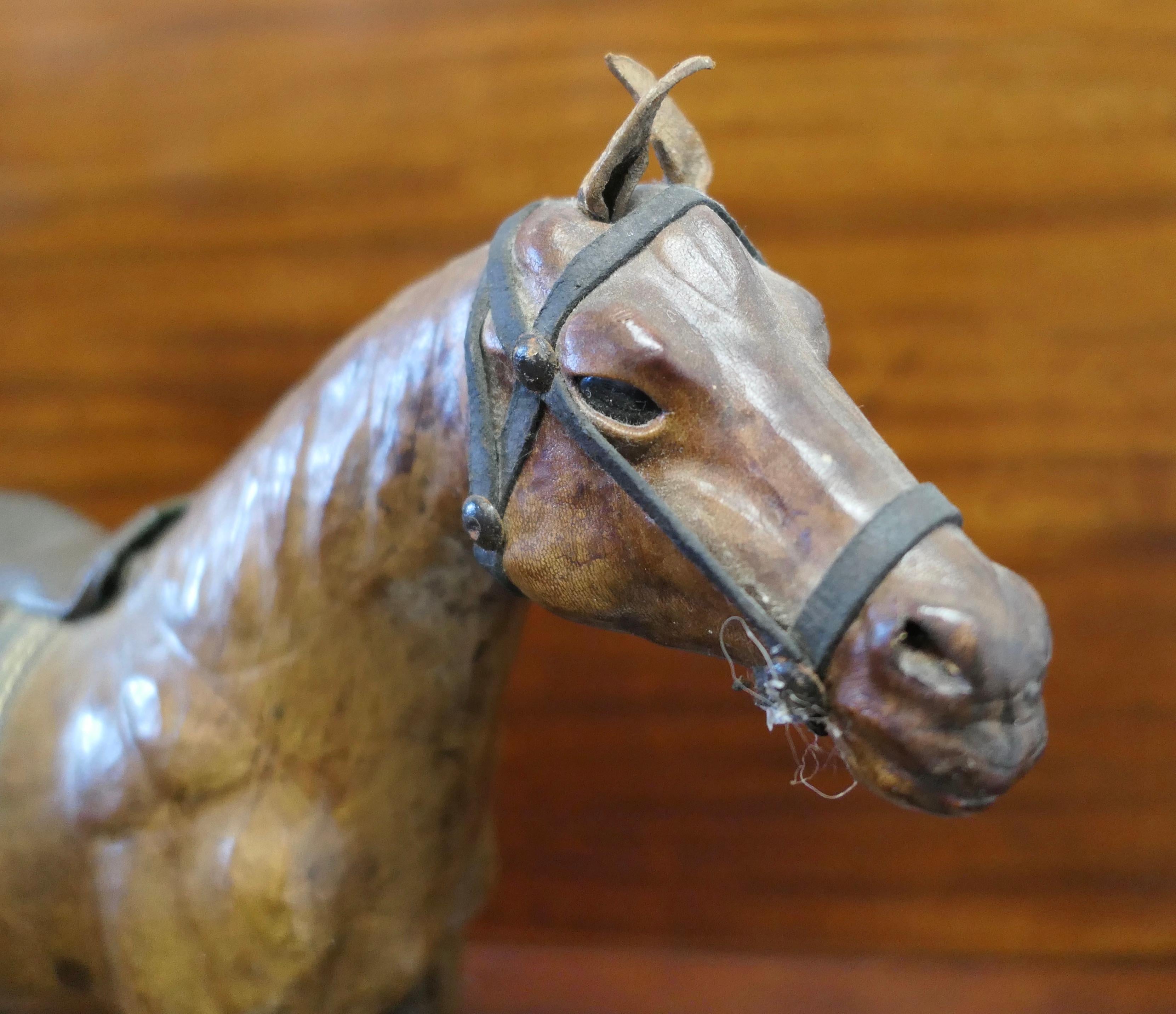 Mid-20th Century Arts and Crafts Leather Model of a Horse  This is a rare and beautiful find  For Sale